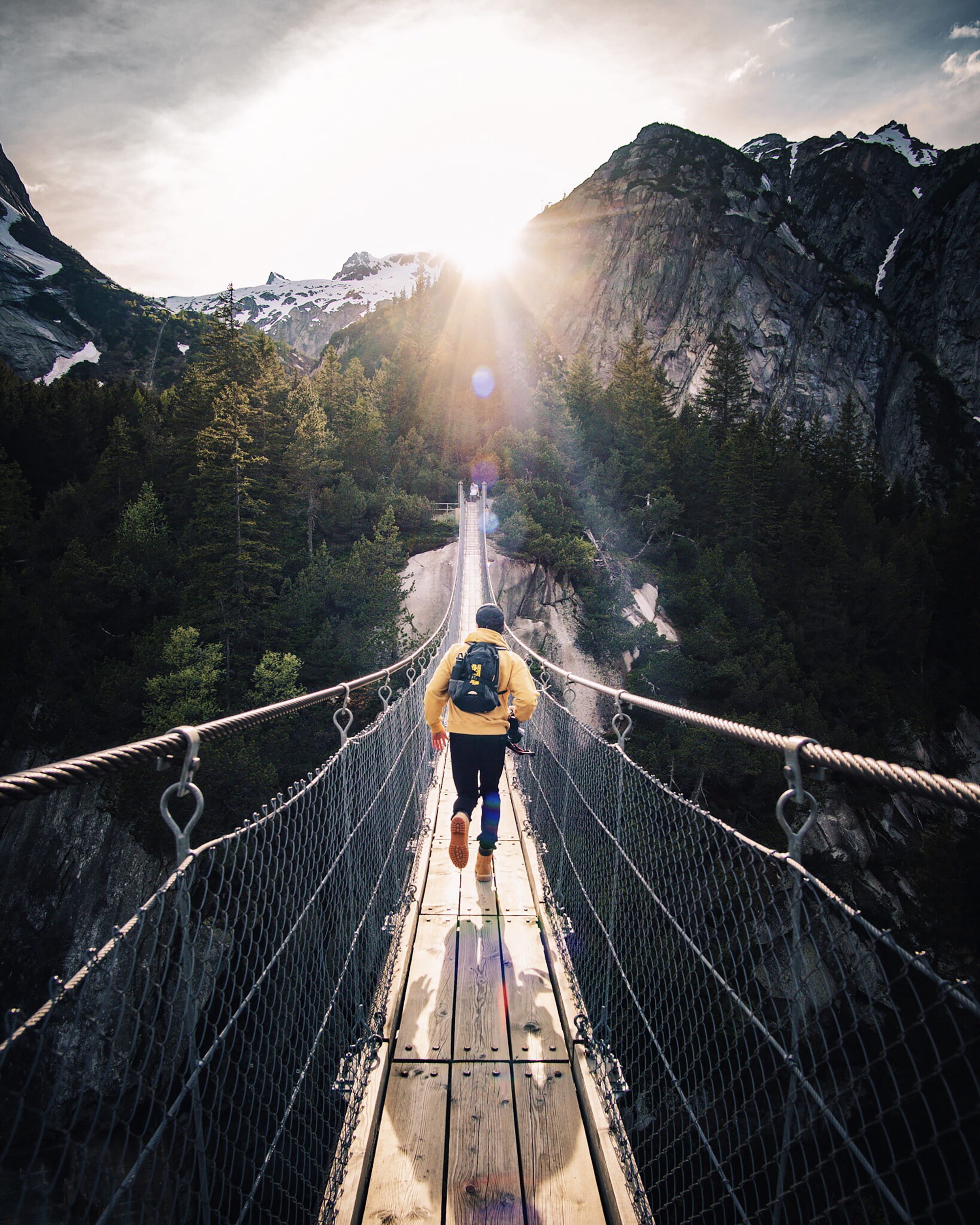 hanging, backpack, run, sky, architecture, sun, day, running, shadow, footbridge, mountain, built structure, yellow, leisure activity, woodland, forest, Phone HD Wallpaper