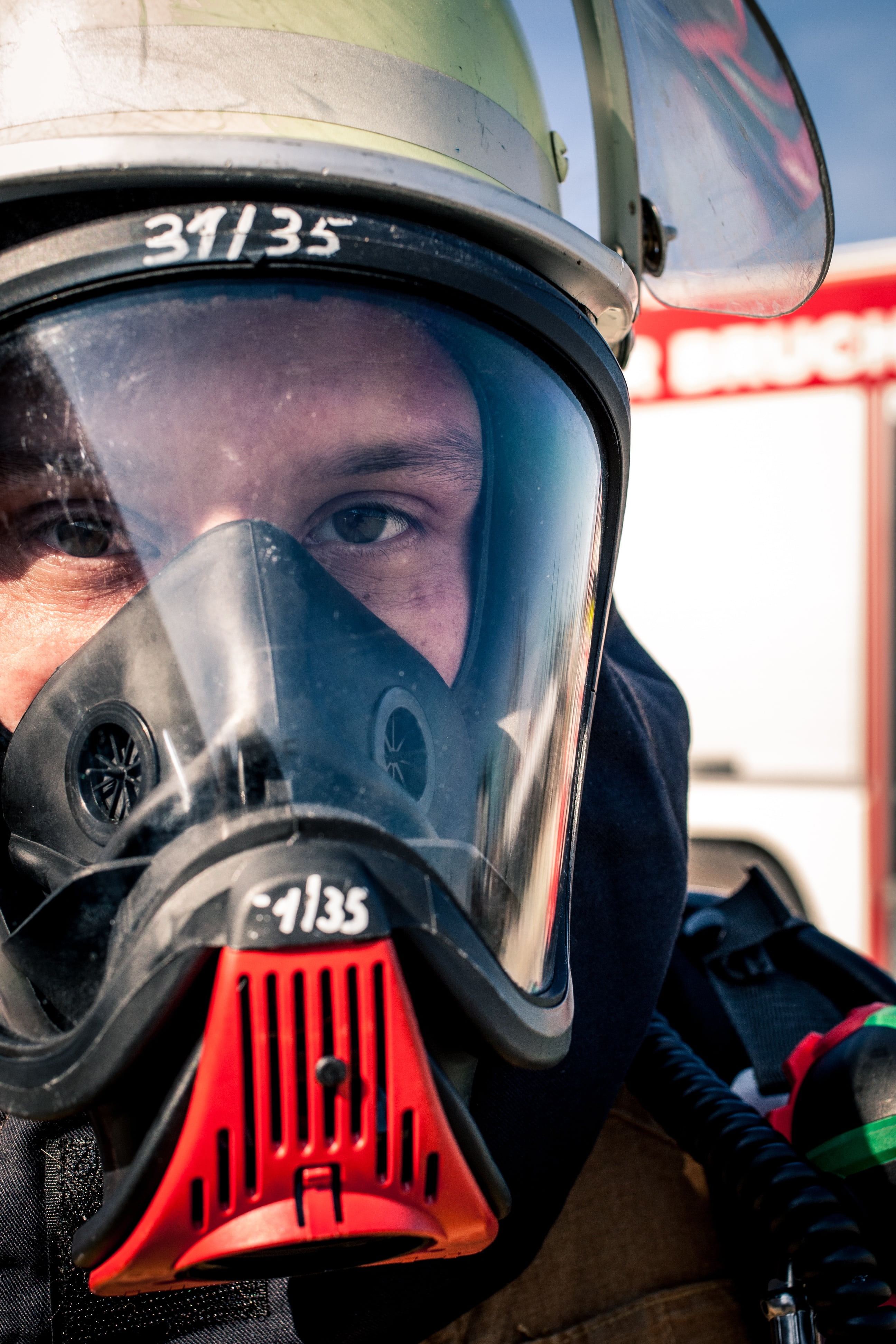 equipment, fire fighter, real people, firefighting job, young adult, mask, day, crash helmet, outdoors, volunteer firefighter, headshot, security, looking at camera, Phone HD Wallpaper