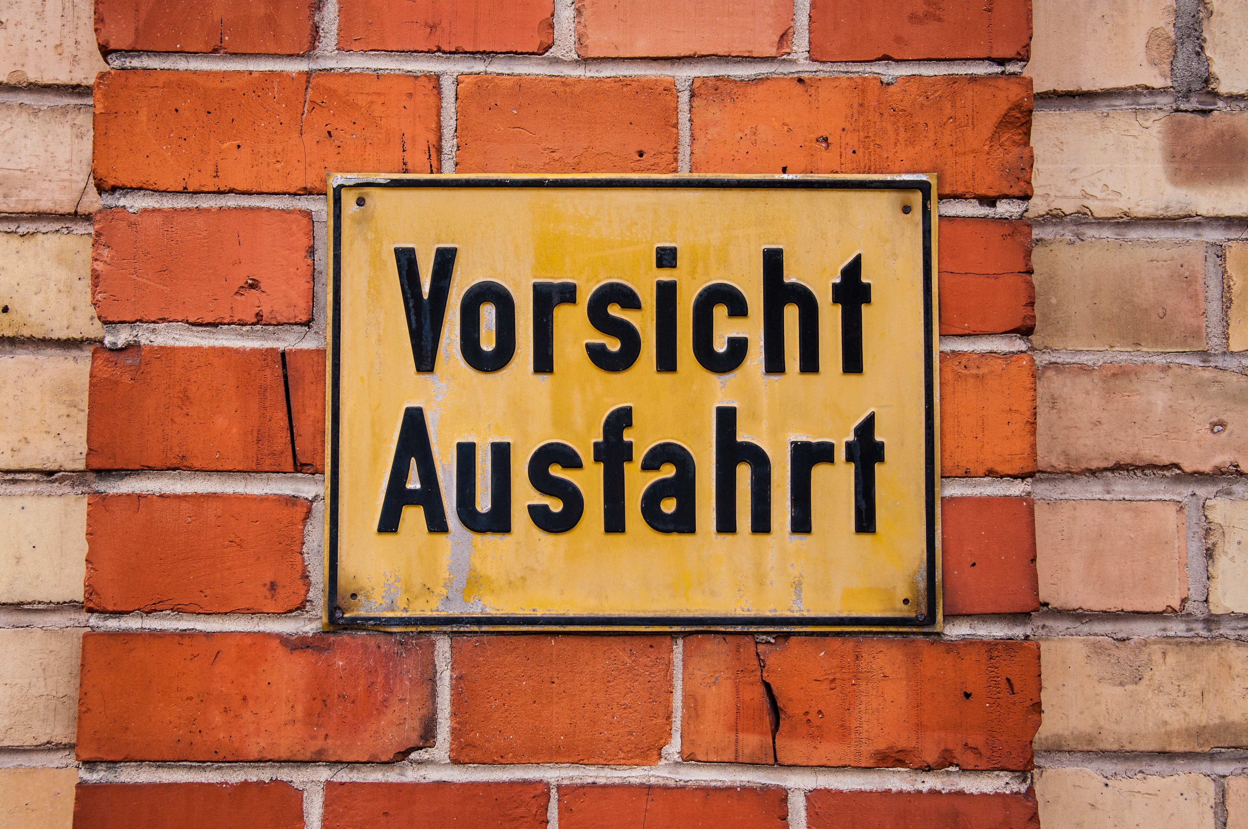 western script, shield, wall, street sign, signal, road, warnschild, sign, architecture, red, building exterior, yellow, warning signs, information, built structure, HD Wallpaper