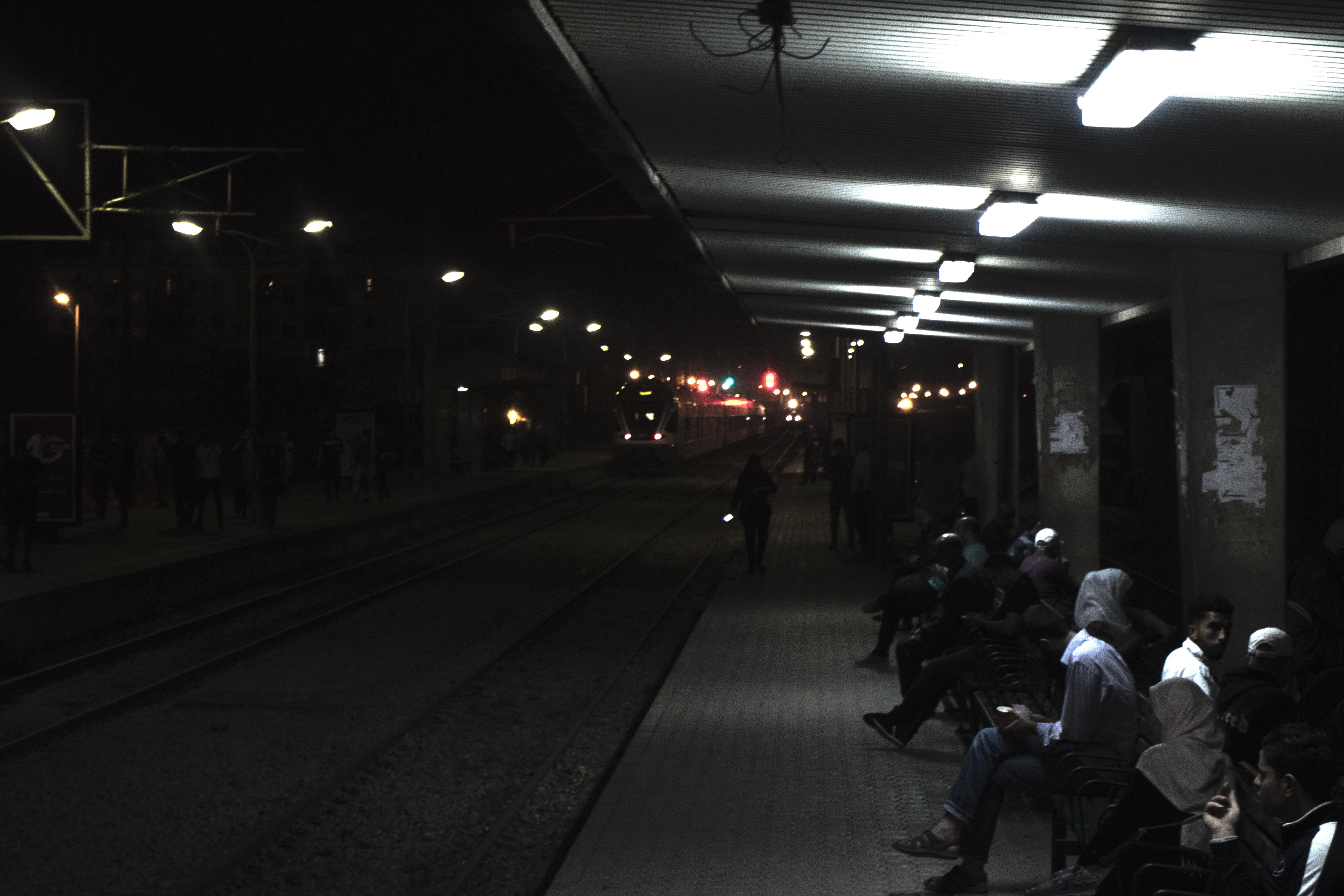 transportation, railroad station, men, track, night, illuminated, travel, mode of transportation, 5K, algeria, waiting, ceiling, railroad track, group of people, HD Wallpaper