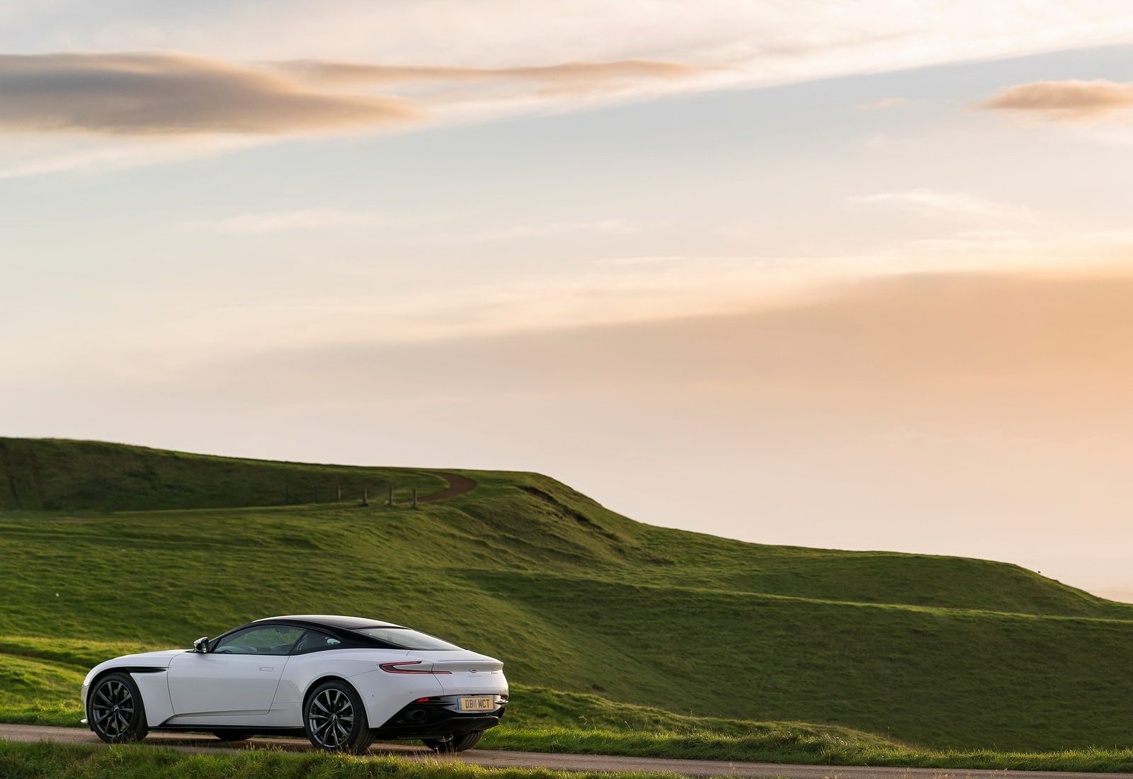 grass, luxury, db11, 720P, sky, motor vehicle, scenics - nature, cloud - sky, mode of transportation, car, land vehicle, aston, land, environment, transportation, HD Wallpaper
