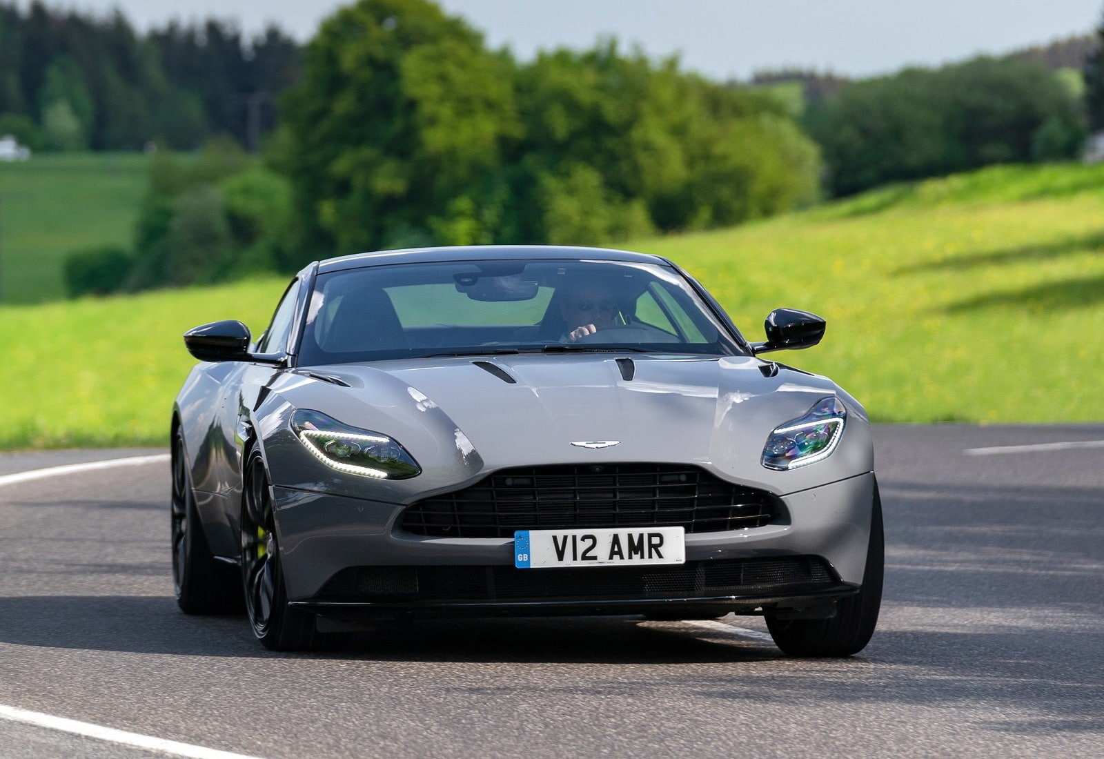 tree, aston, motion, car, symbol, sunlight, street, plant, nature, motor vehicle, travel, sports car, land vehicle, outdoors, martin, luxury, day, mode of transportation, HD Wallpaper