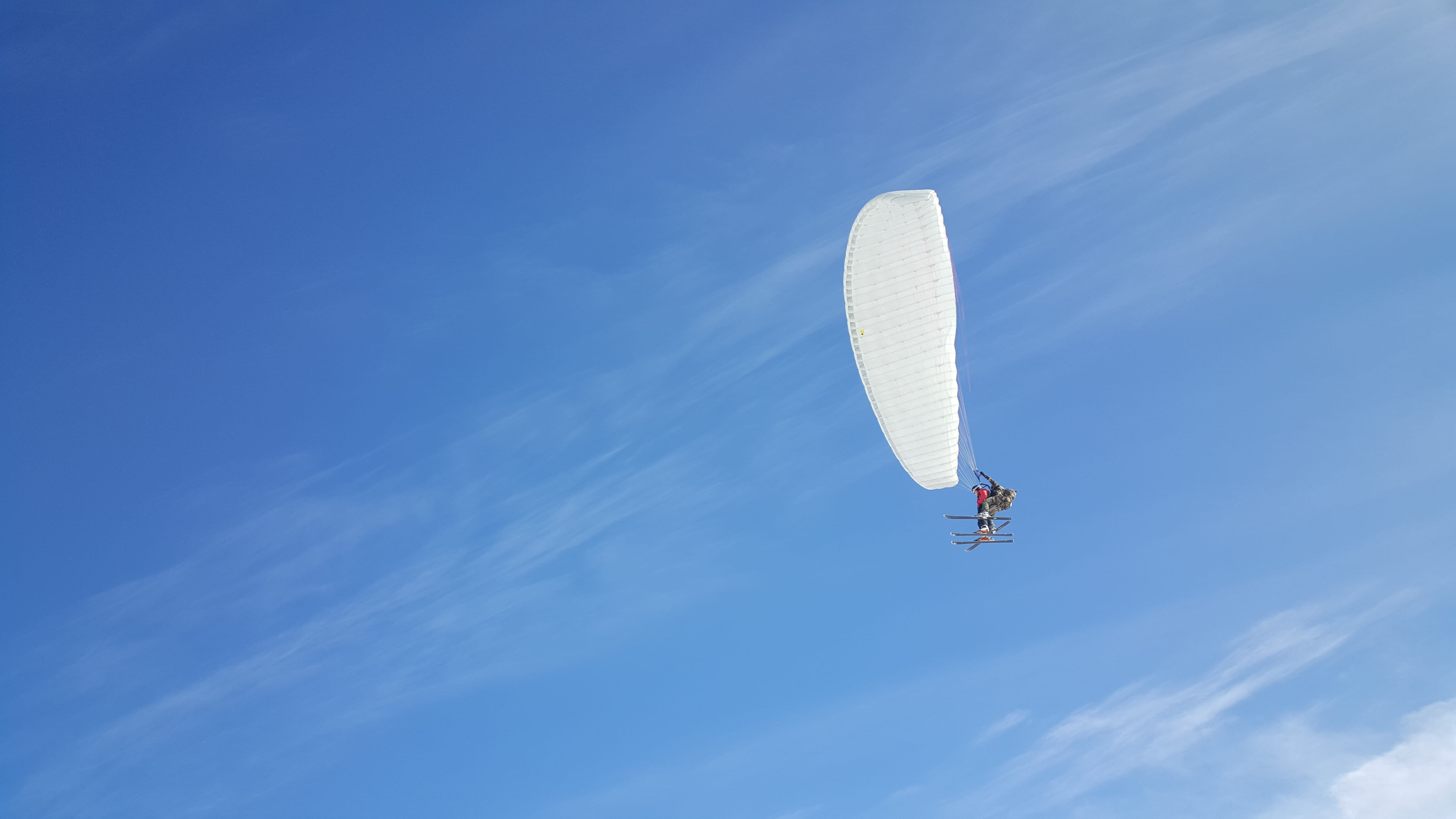 blue, outdoors, gliding, joy, skier, alps, transportation, unrecognizable person, day, danger, paragliding, slope, sky, two people, france, skiing, extreme sports, HD Wallpaper