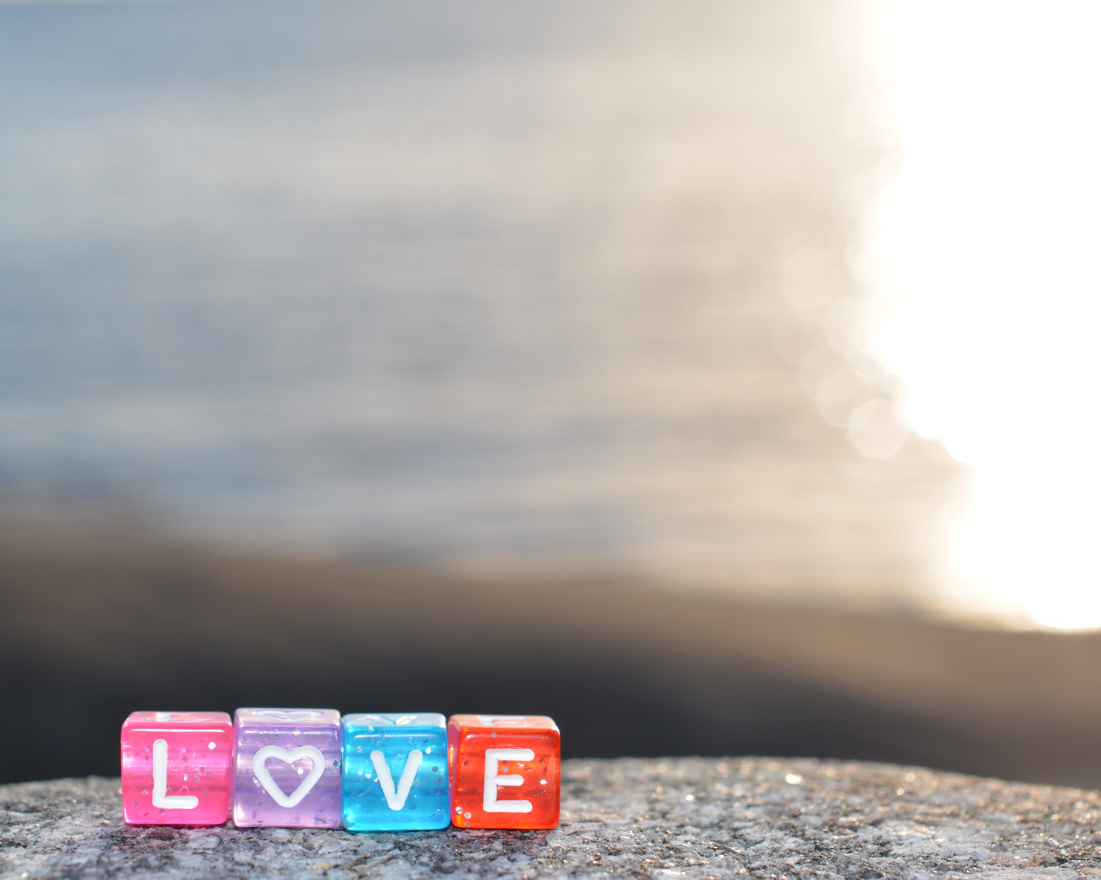 heart-shaped, short, letters, toy, sunlight, red, gray, sea, outdoors, love, table, day, beads, cube, no people, surface, 4K, summer, number, container, HD Wallpaper
