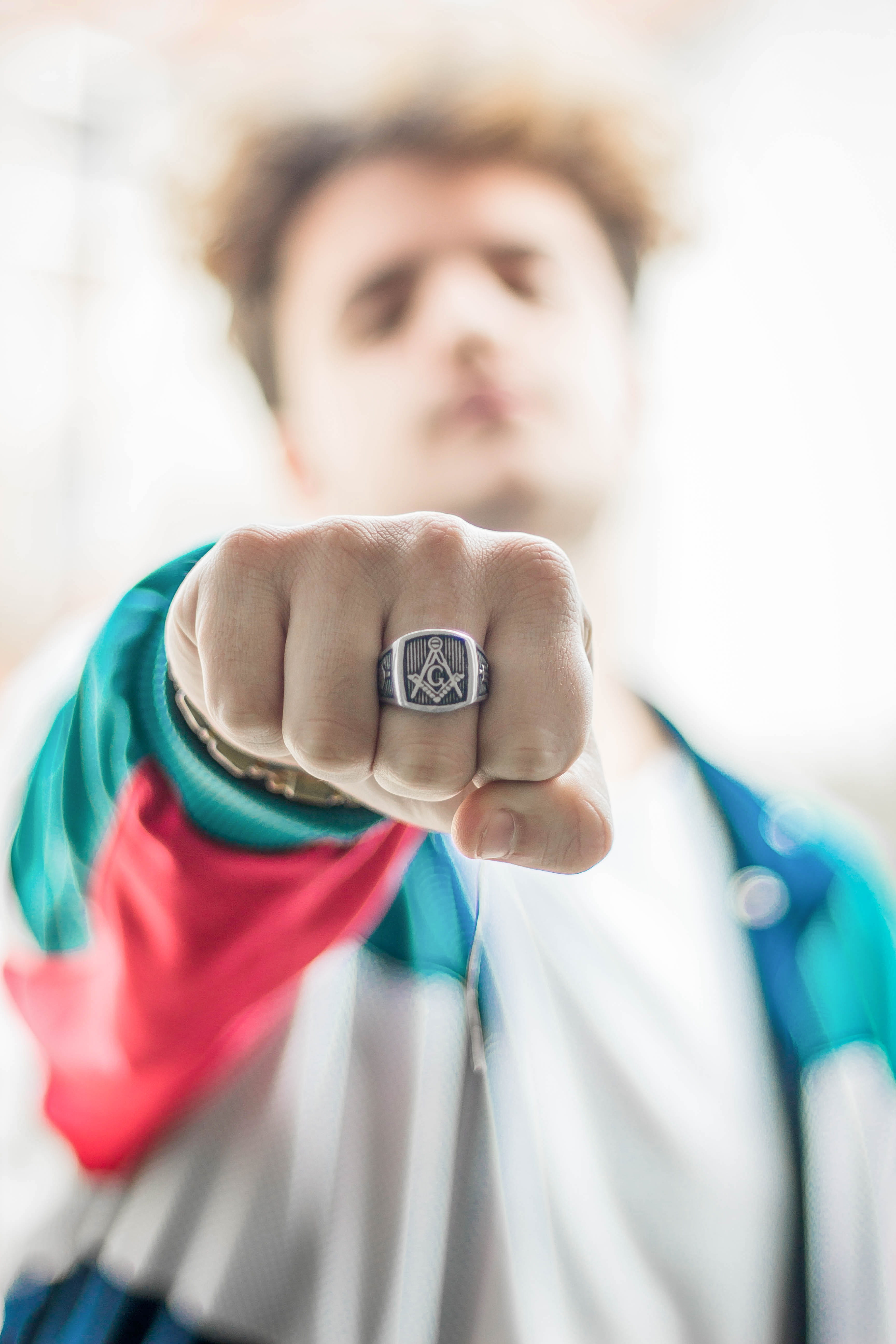 man, day, emotion, technology, one person, fist, showing, holding, human body part, human hand, young adult, front view, hand, mason, ring, adult, healthcare and medicine, Phone HD Wallpaper
