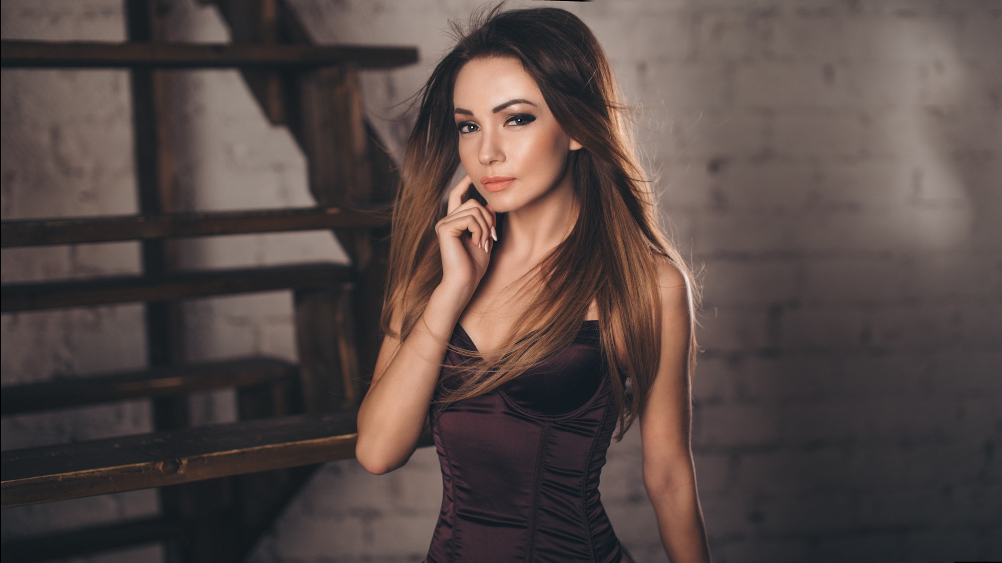 women, stairs, painted nails, brown eyes, looking at viewer, brunette, 1080P, corset, women indoors, hand on face, long hair, corsage, straight hair, HD Wallpaper