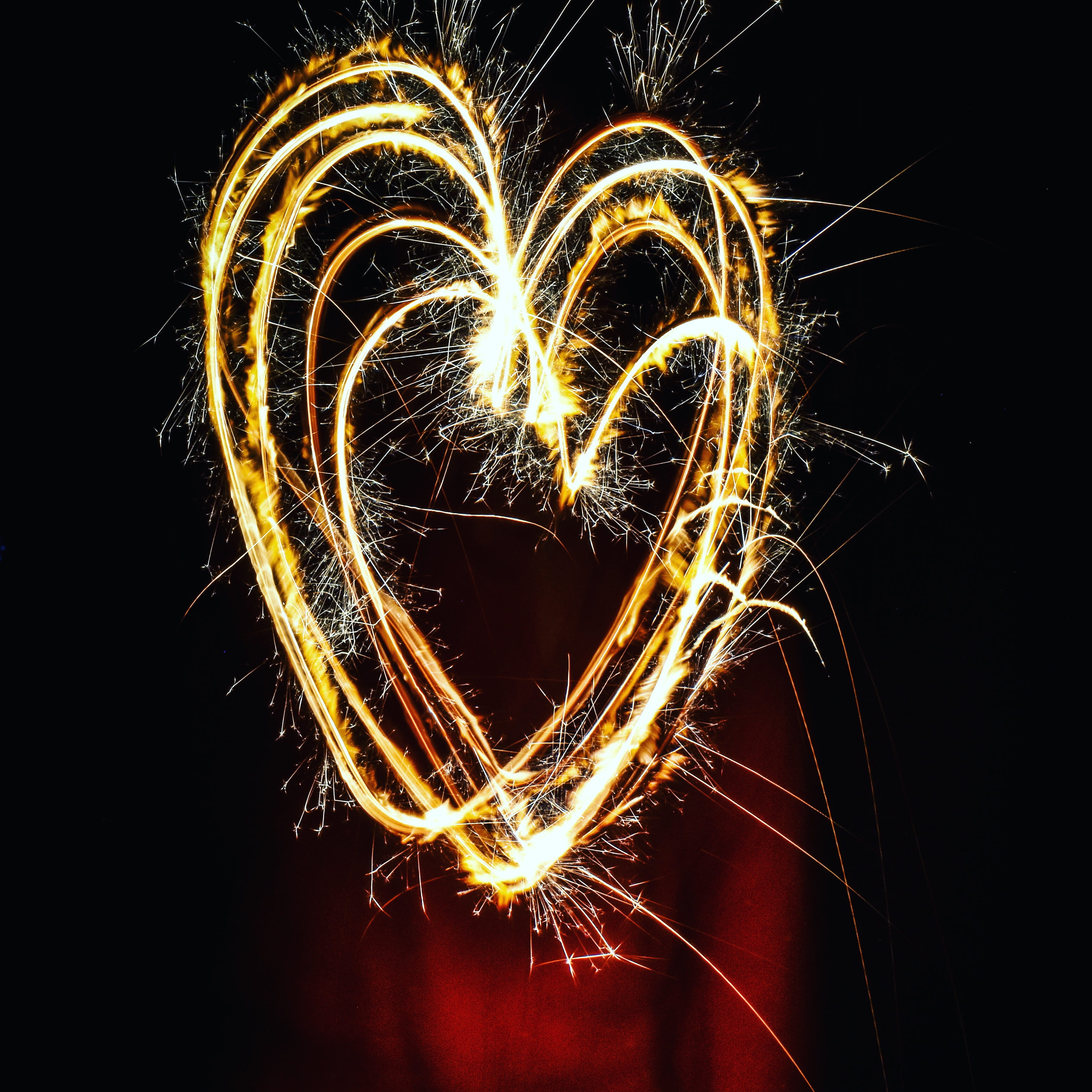 black background, arts culture and entertainment, love, light painting, glowing, no people, event, heart shape, light, positive emotion, sparkling, burning, Phone HD Wallpaper