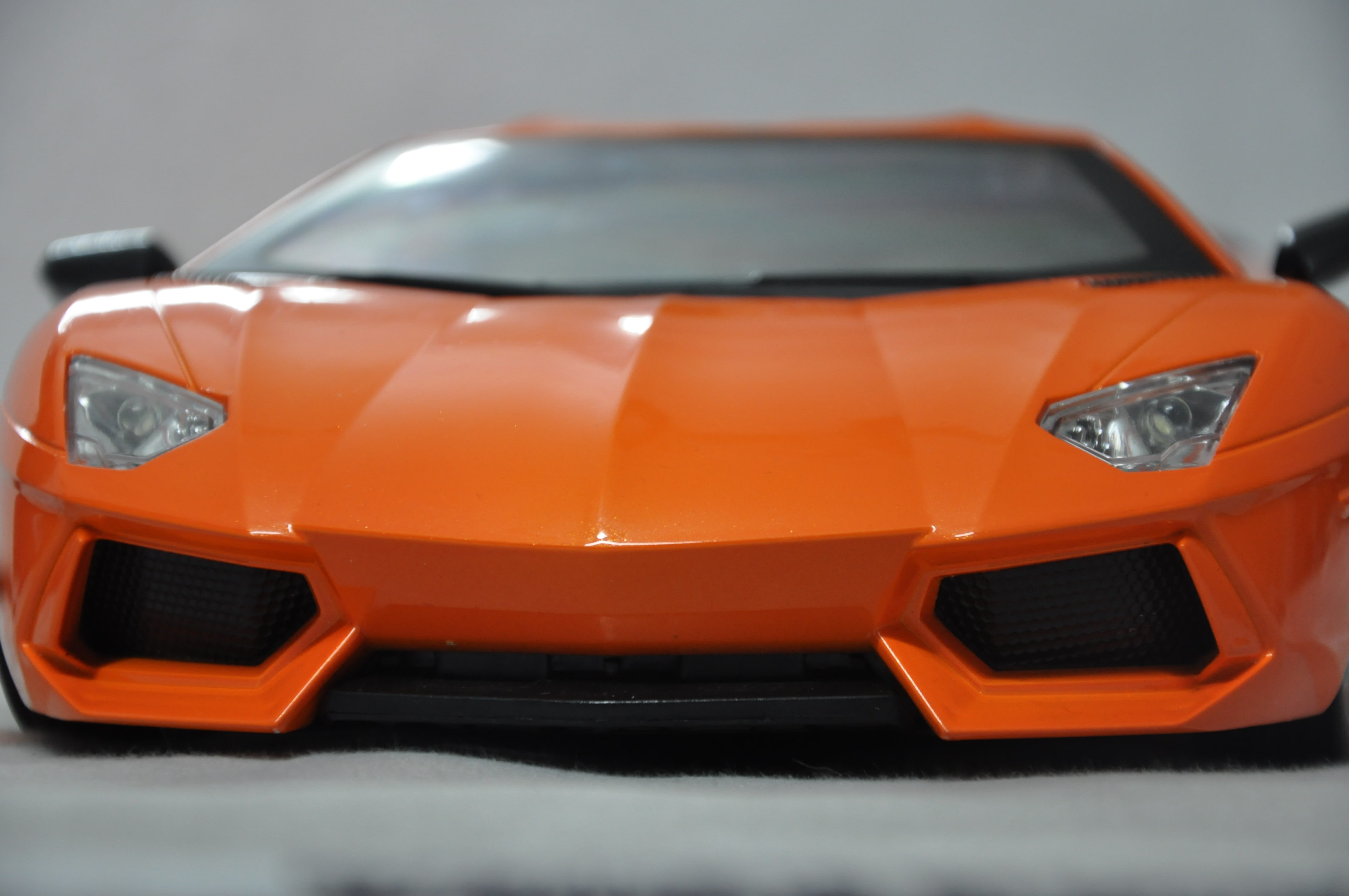 Lamborghini, yellow, motor vehicle, racecar, safety, 4K, headlight, studio shot, no people, wheel, black color, photography, stationary, indoors, modern, HD Wallpaper