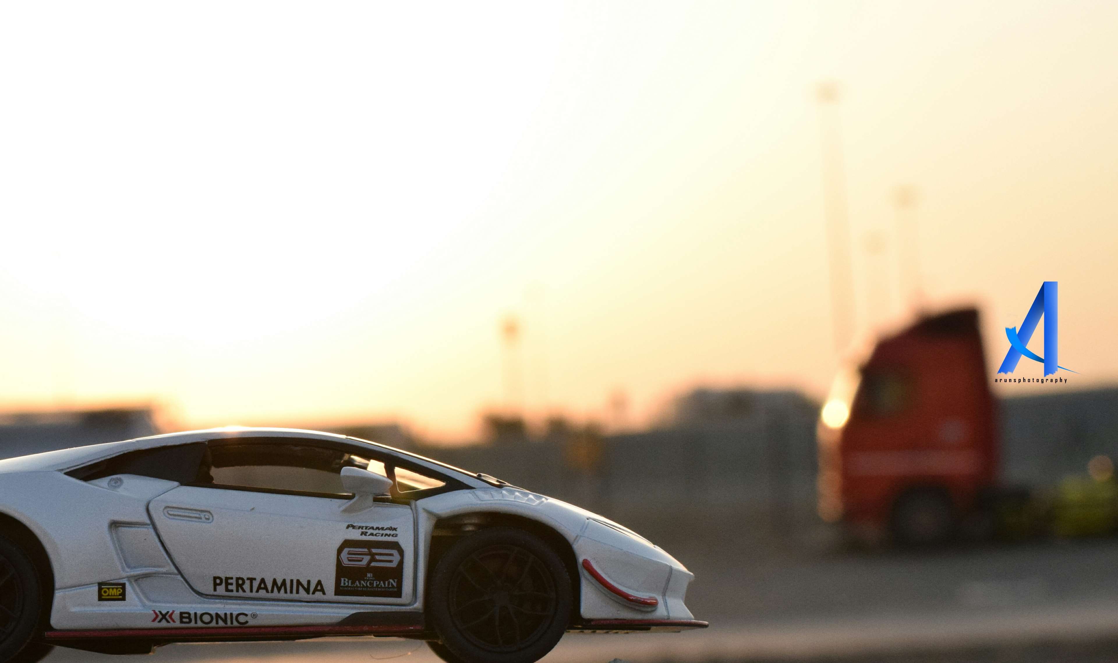 sunset, copy space, nature, focus on foreground, arunsphotography, sky, city, travel destinations, close-up, flag, white car, motor vehicle, lamborghini, HD Wallpaper