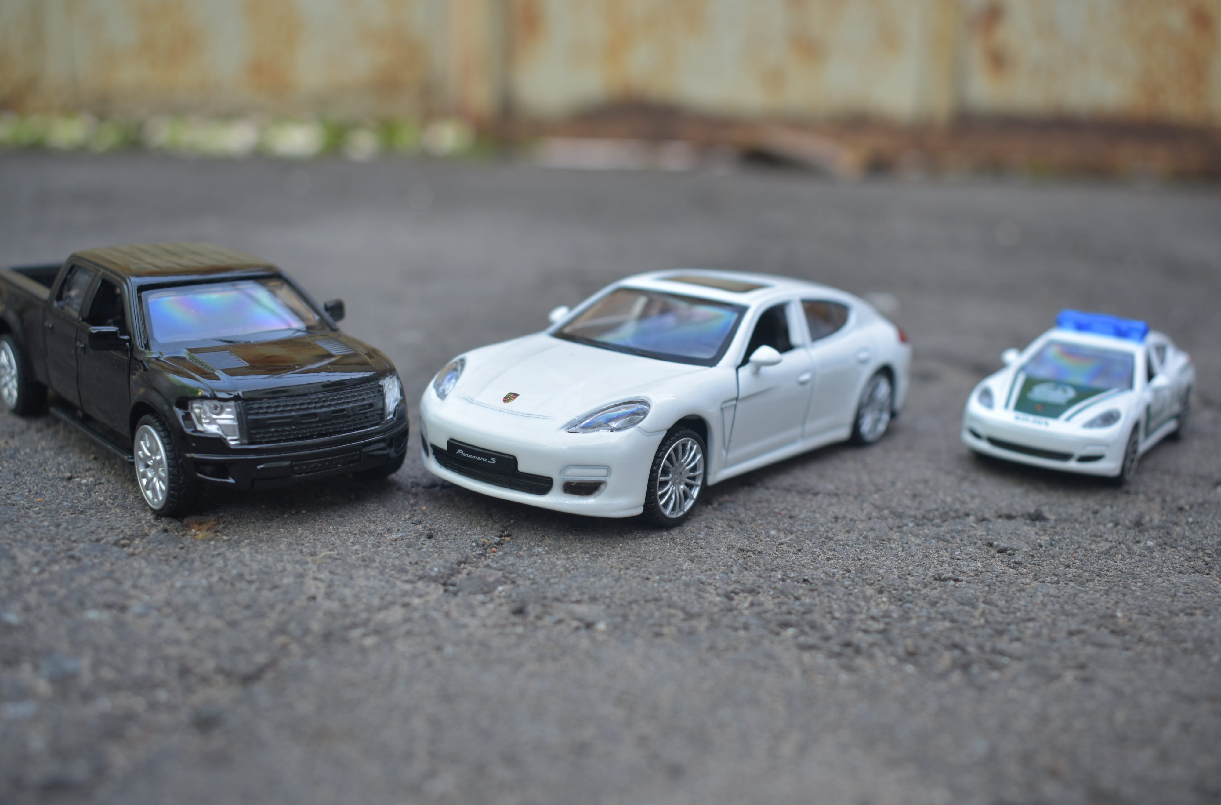 city, car, small, toy, police, street, still life, no people, auto, land vehicle, 4K, close-up, architecture, road, motor vehicle, day, diecast, miniature, HD Wallpaper