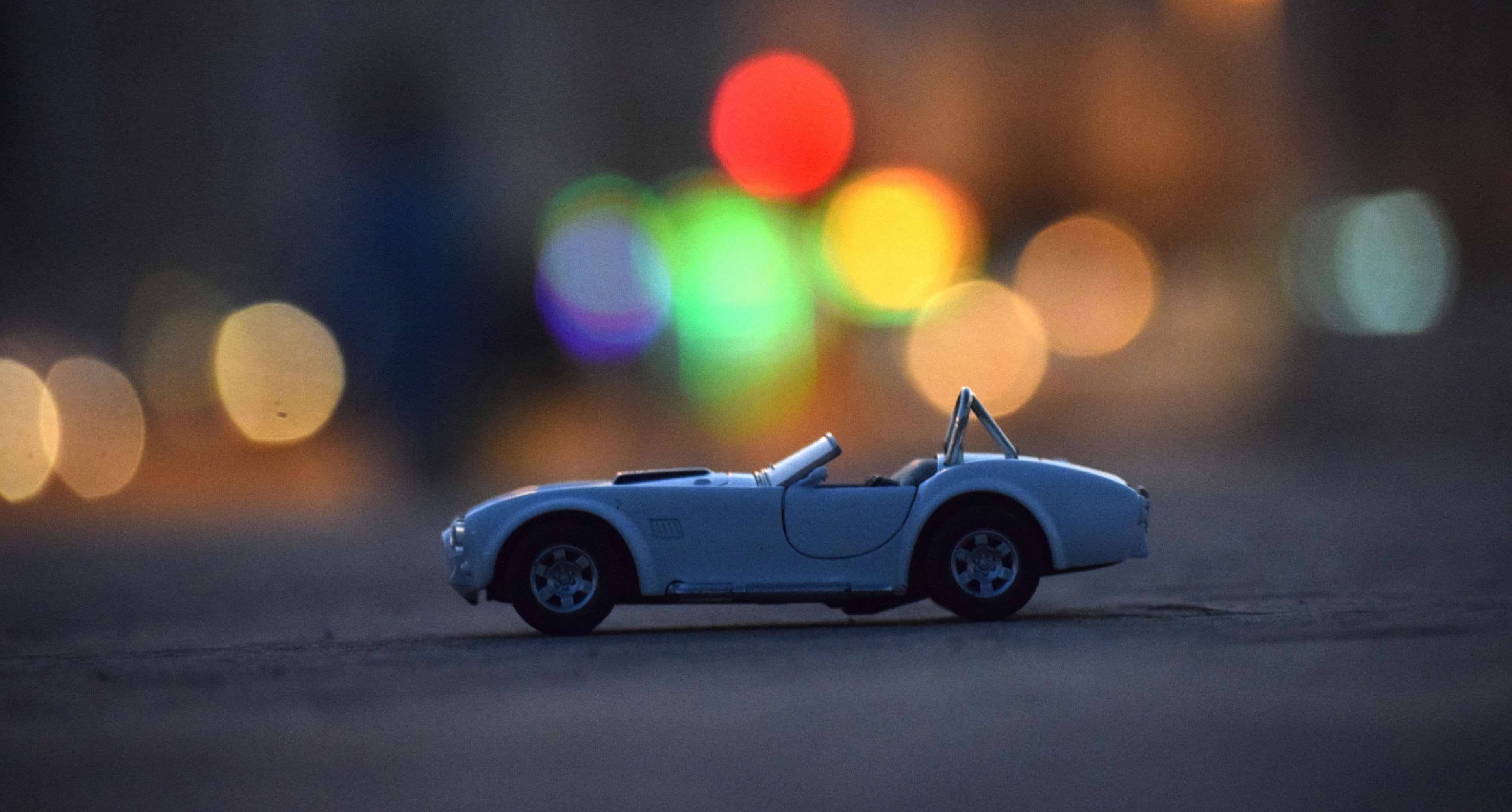 defocused, small, toy car, street, traffic, night, mode of transportation, car, diecast photography, land vehicle, transportation, white car, travel, bokeh, HD Wallpaper