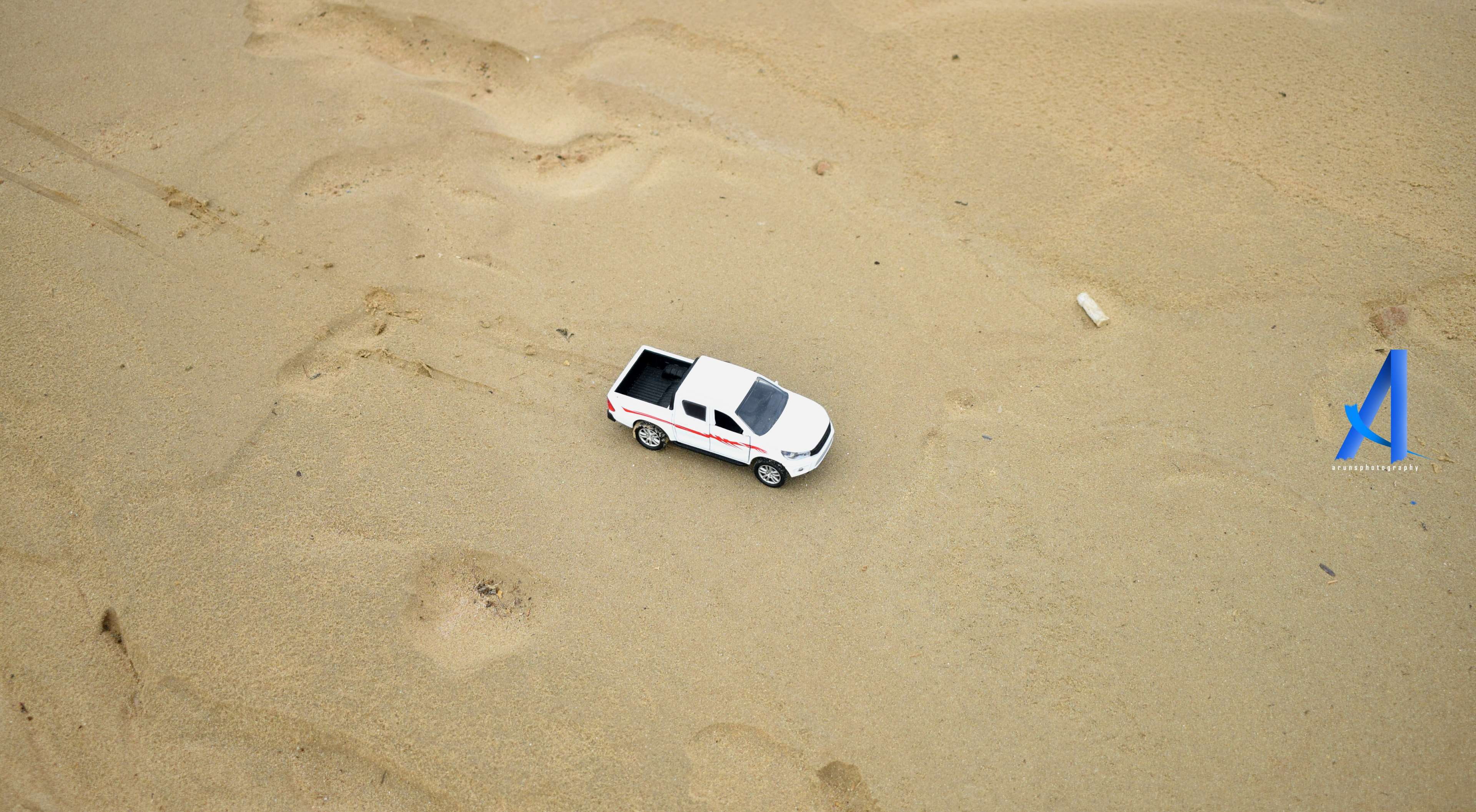 vacations, day, nature, flag, transportation, toy car, sand, desert, toyota, arunsphotography, 4K, diecast cars, white car, beach, no people, helicam view, HD Wallpaper