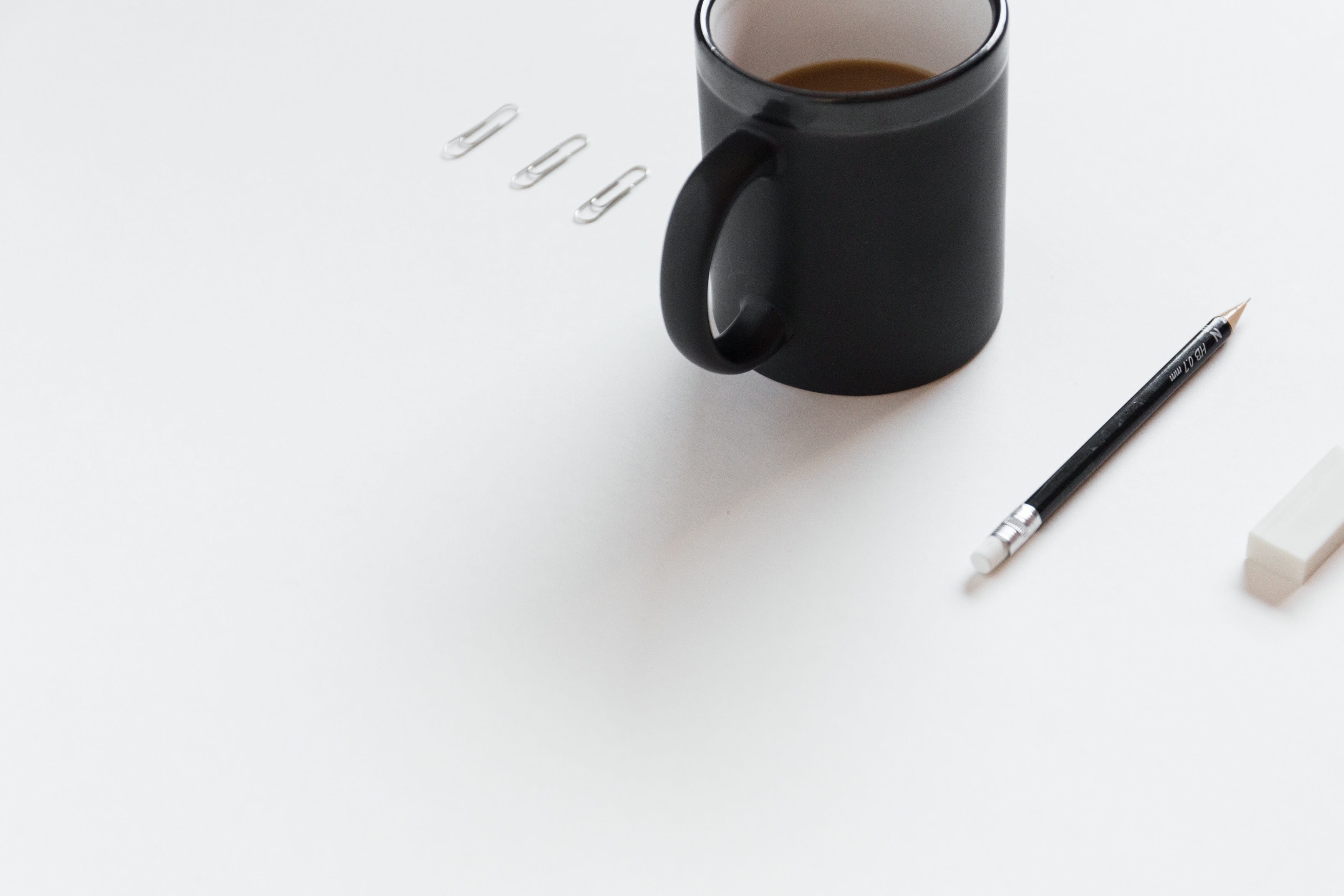 white surface, office, black, 2K, coffee, coffee mug, no people, pen, silver colored, coffee cup, drink, indoors, paper, beside, coffee - drink, surface, HD Wallpaper