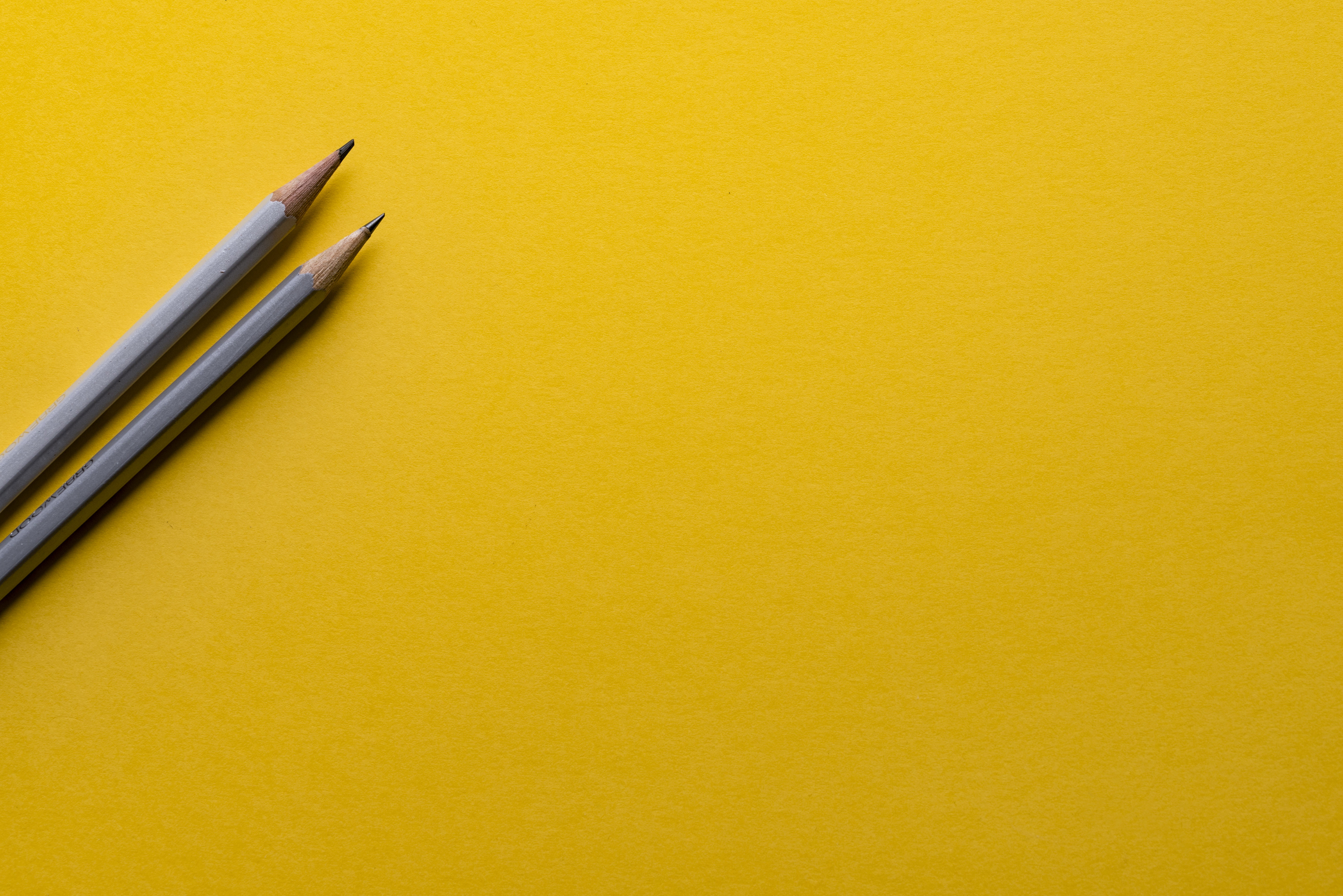 yellow background, indoors, backgrounds, writing instrument, pencil, paper, cut out, office, still life, 5K, business, drawing, gray, art, creative, close-up, HD Wallpaper