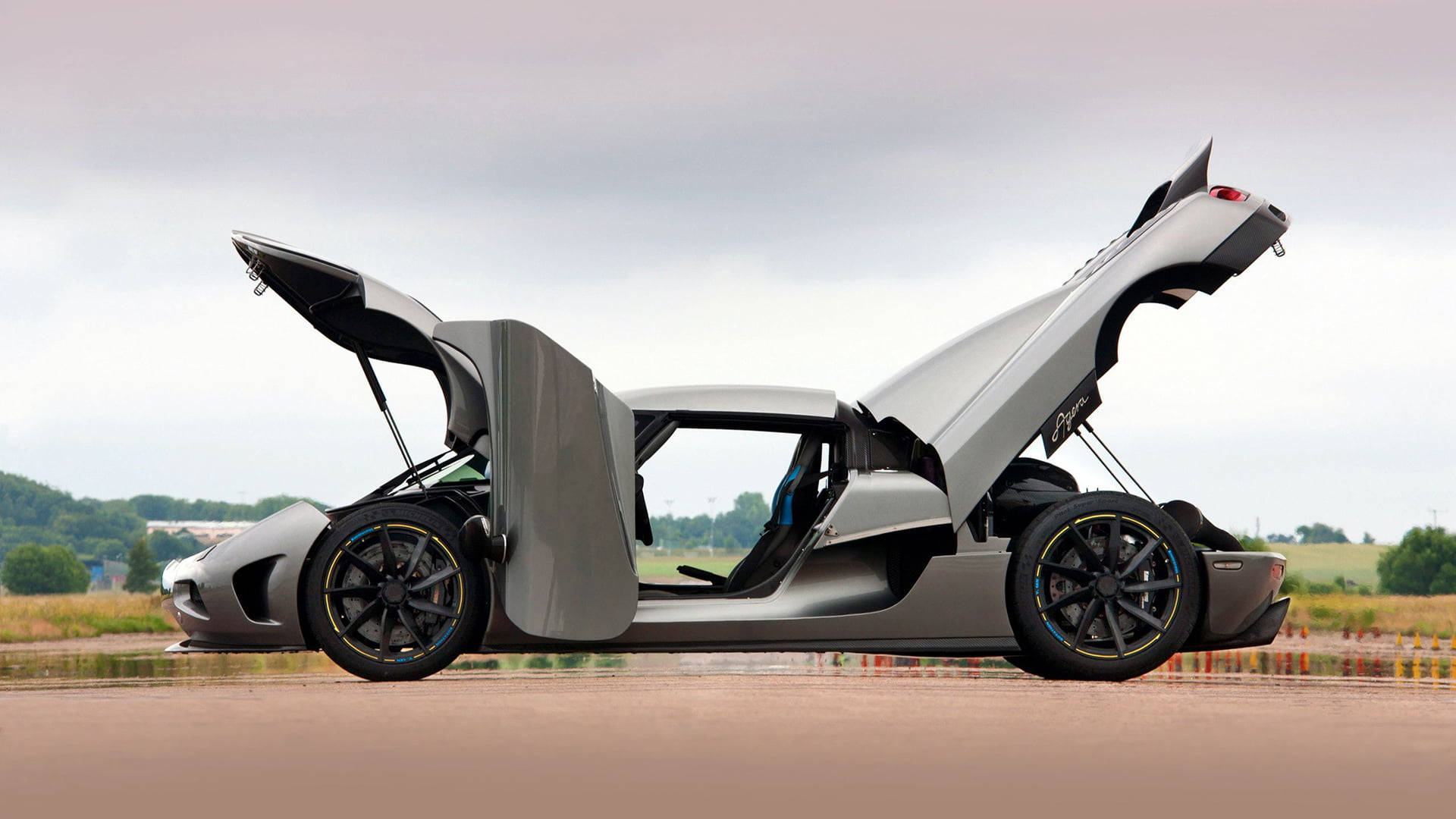 land vehicle, sky, vehicle, 1080P, outdoors, lease, auto, black, metal, nature, motor vehicle, airport, chrome, automobile, boundary, style, shiny, wheel, HD Wallpaper