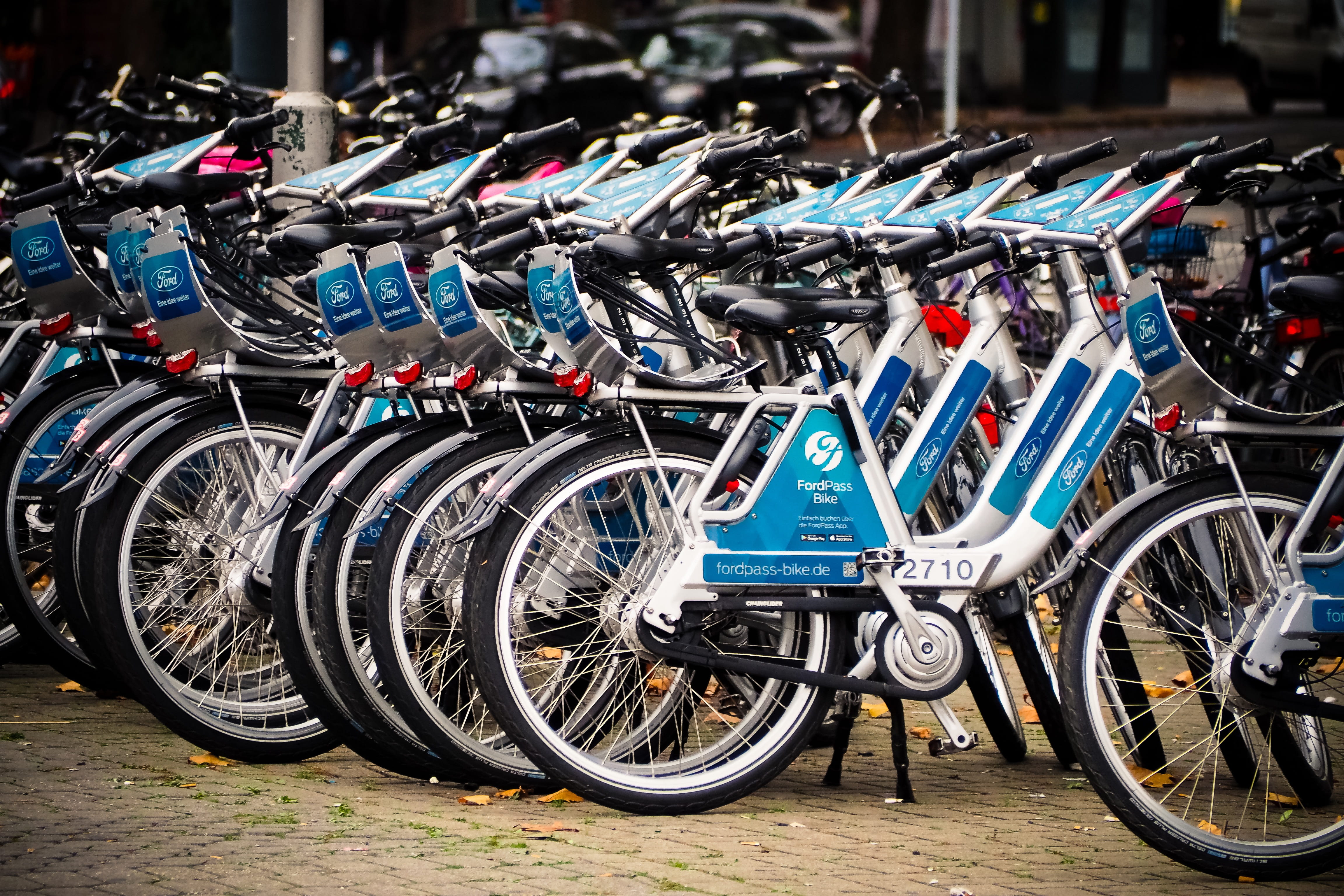 bicycle, day, street, in a row, metal, station, travel, focus on foreground, road, wheel, spoke, stationary, abundance, rental bike, cycle, parking lot, HD Wallpaper