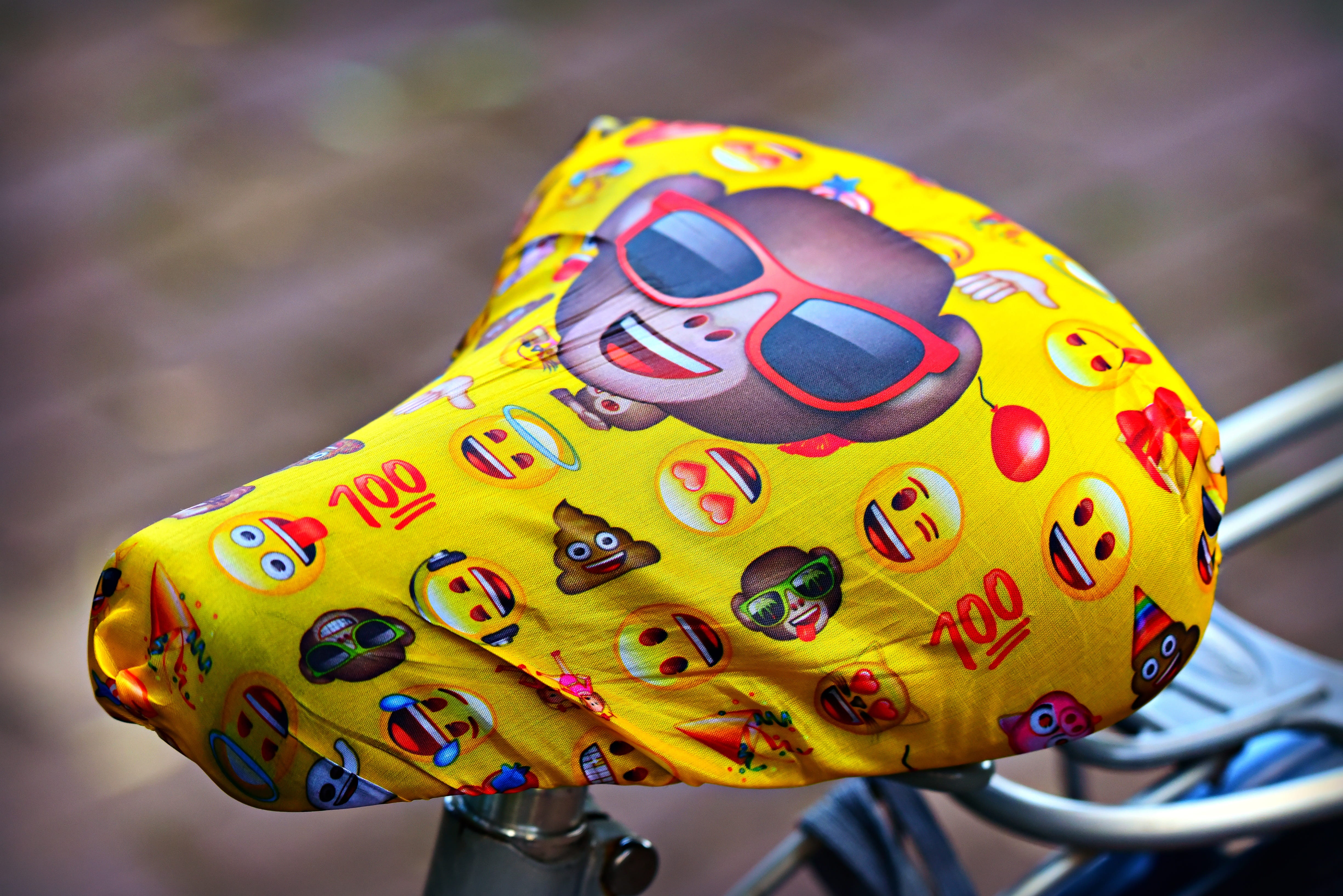 toy, trendy, bicycle saddle, close-up, childhood, art and craft, paint, outdoors, fun, 4K, seat, cover, yellow, fashionable, craft, colorful, sunglasses, HD Wallpaper
