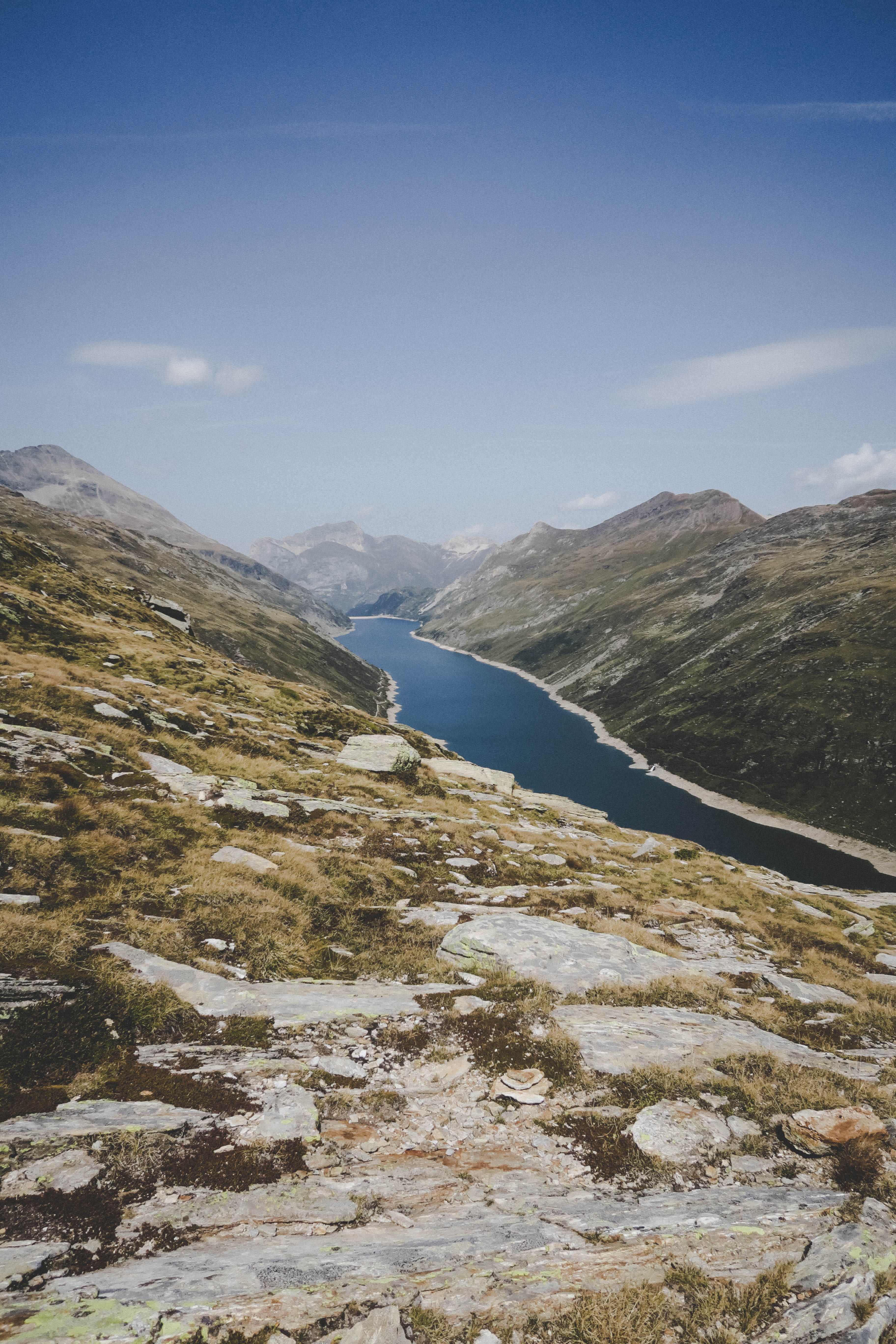 near, nature, calm, mountain range, landscape, mountain, blue, flowing, green, valley, outdoors, mountains, non-urban scene, tranquility, water, rocks, Phone HD Wallpaper