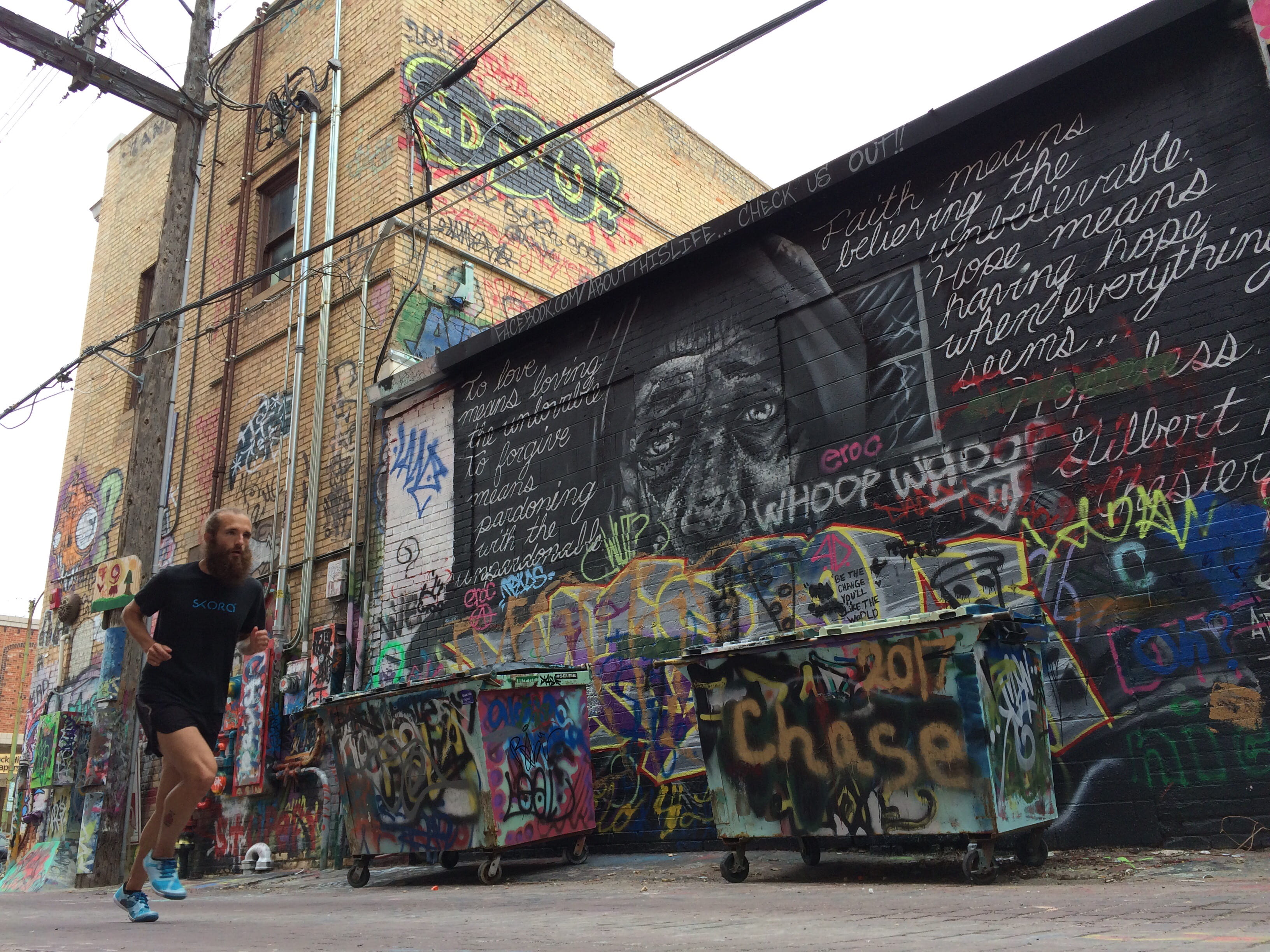 near, person, creativity, street, urban art, lifestyles, communication, alley, built structure, blue shoe, runner, architecture, dumpsters, man bun, running, HD Wallpaper