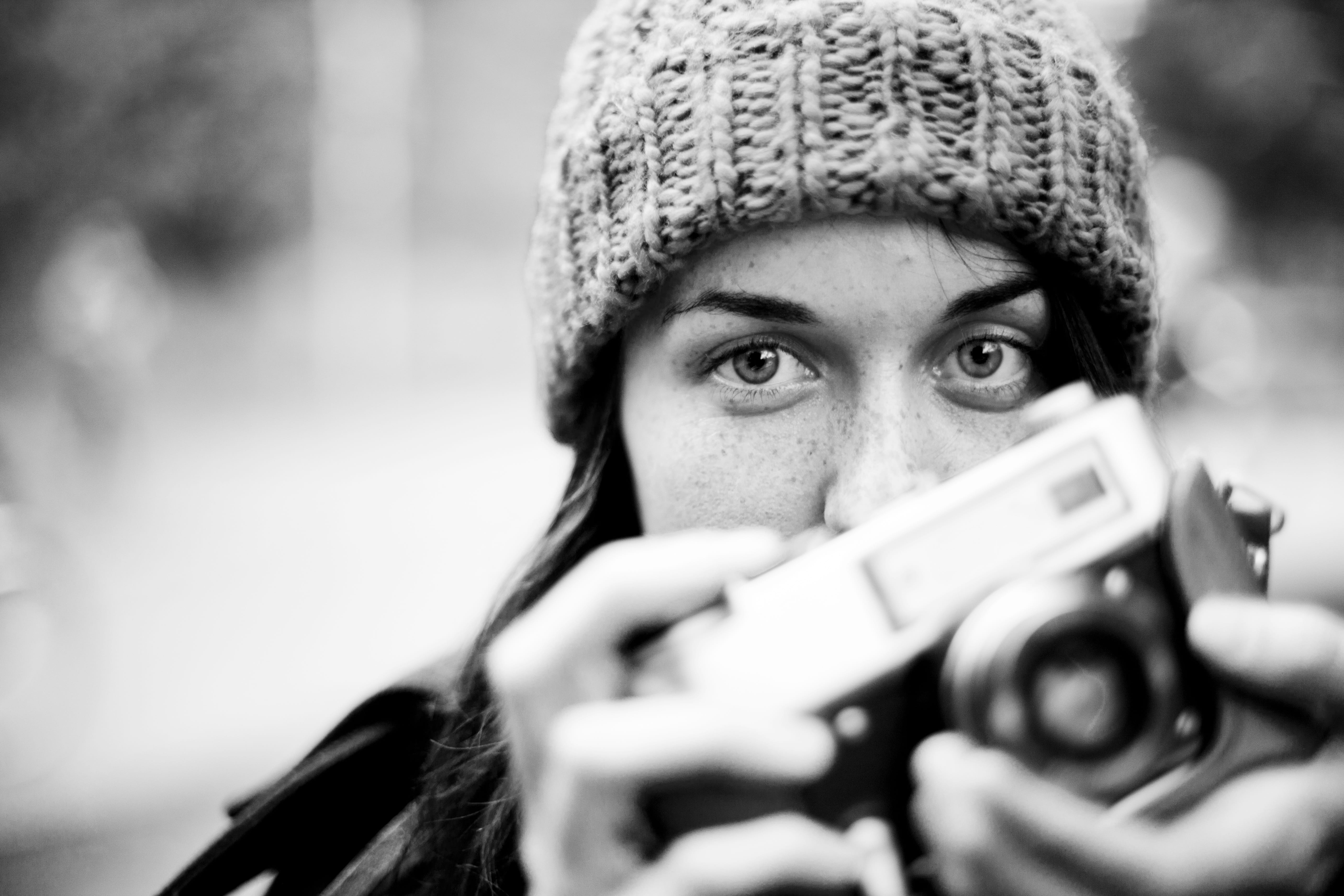 camera, clothing, black-and-white, shoot, hands, cap, day, headshot, one person, person, beautiful, focus on foreground, holding, photography themes, model, HD Wallpaper