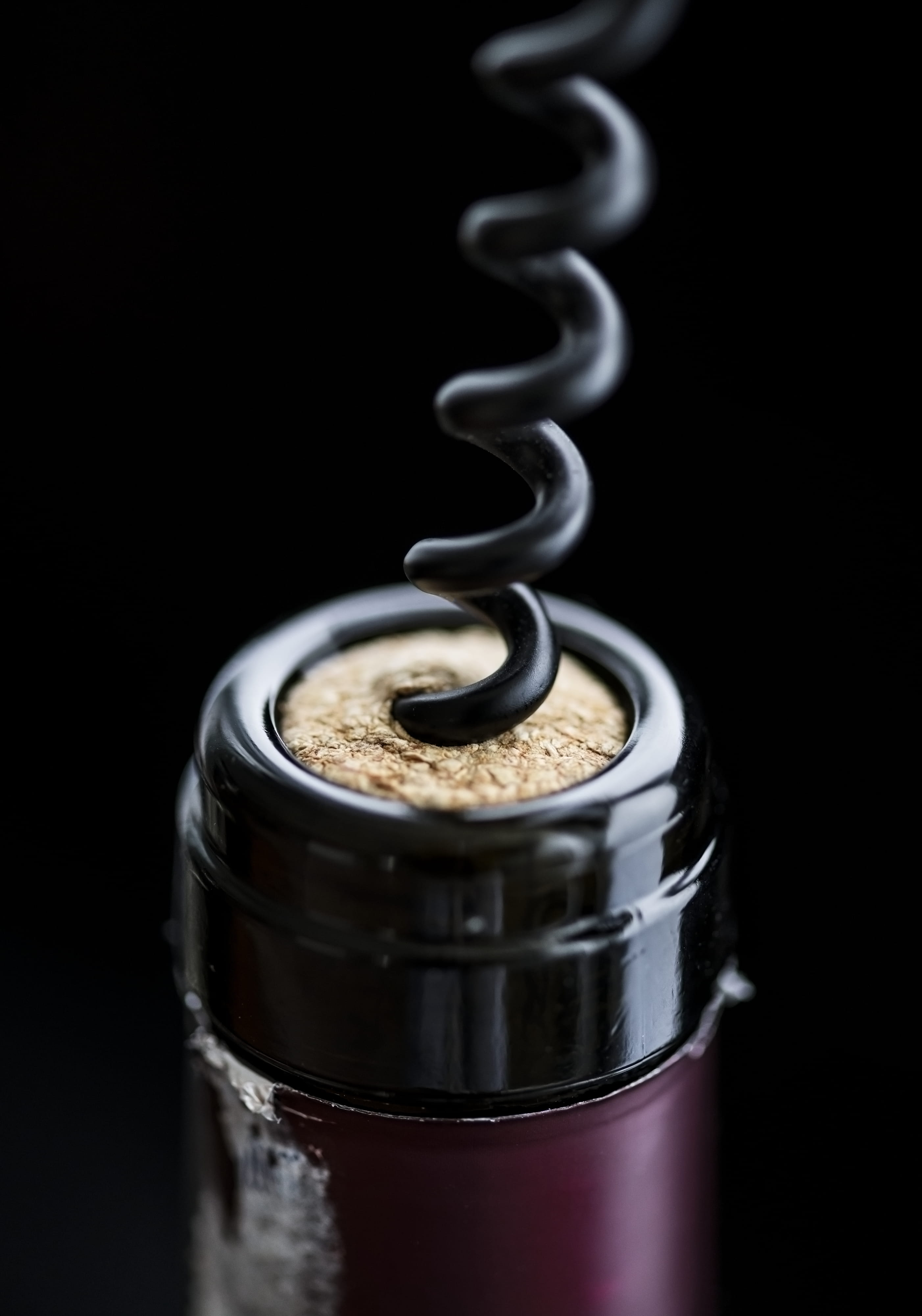 close, studio shot, refreshment, corkscrew, bottle, cork - stopper, opening, metal, no people, wine, alcohol, focus, indoors, still life, black background, Phone HD Wallpaper