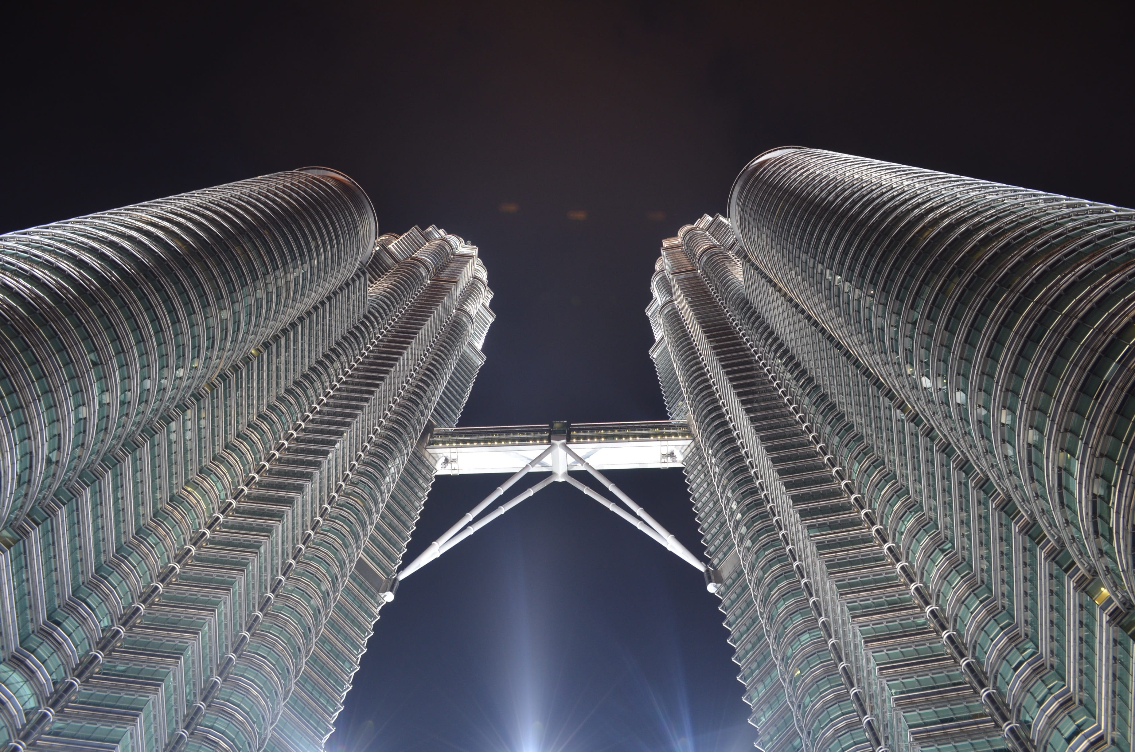 skyscraper, klcc, twin, low angle view, night, tower, modern, travel destinations, built structure, Kuala Lumpur, connection, nature, landmark, photography, HD Wallpaper