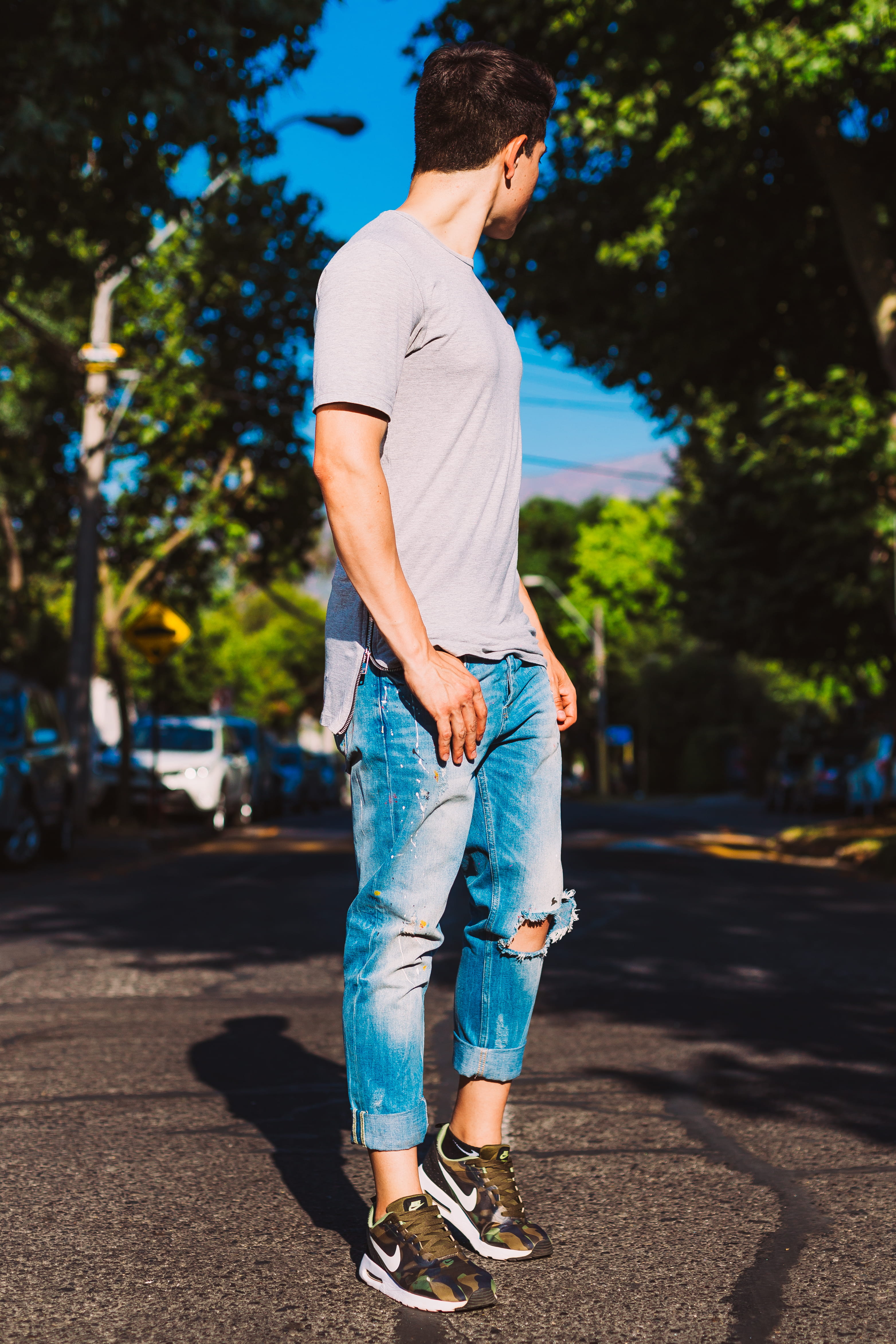 jeans, casual clothing, young men, leisure activity, day, shadow, las condes, chile, nature, full length, sunlight, tree, one person, city, young adult, Phone HD Wallpaper