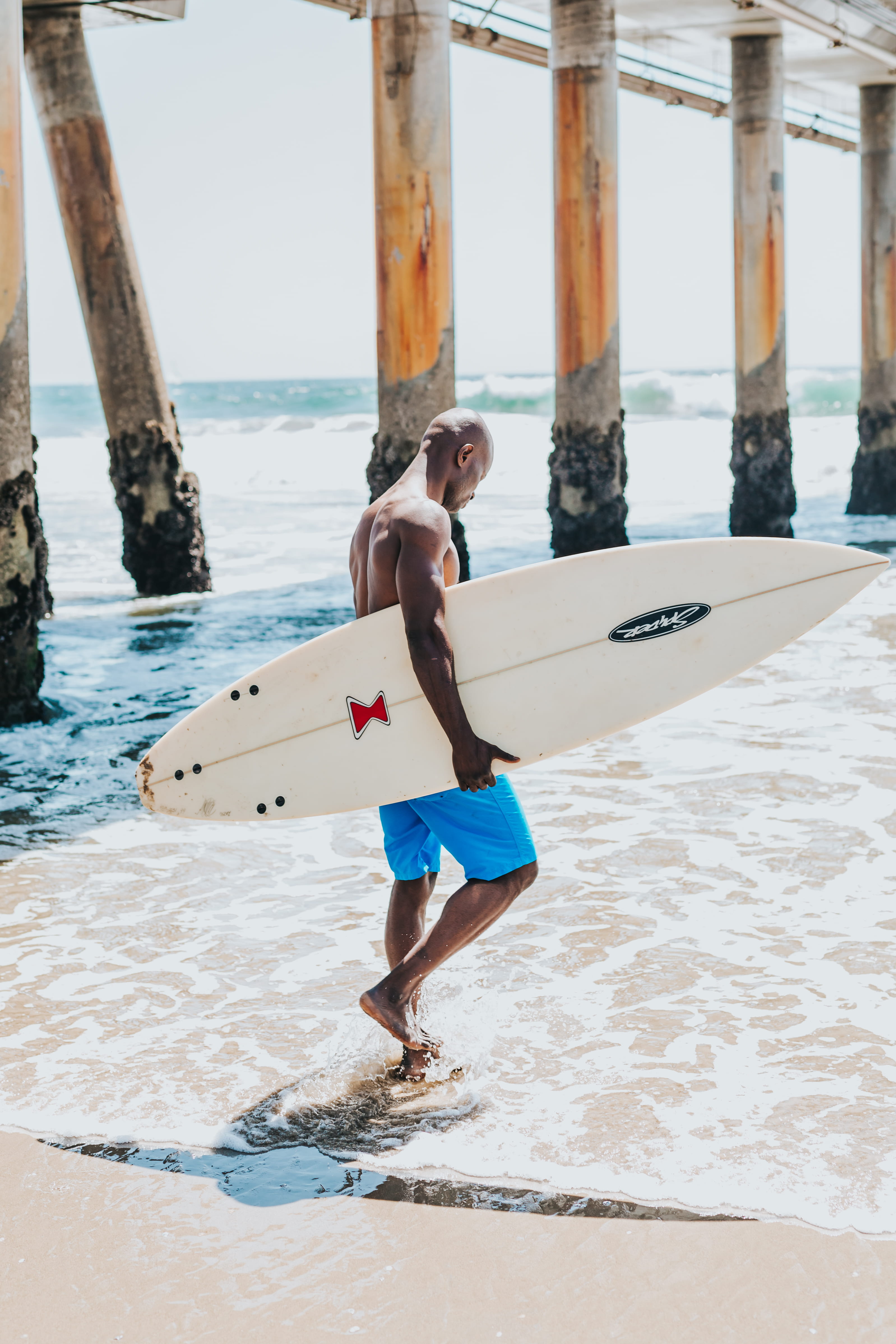 across, child, surfboard, swim, beach, lifestyle, african american, carry, short, outdoors, water sport, fashion, surfer, shore, full length, real people, Phone HD Wallpaper