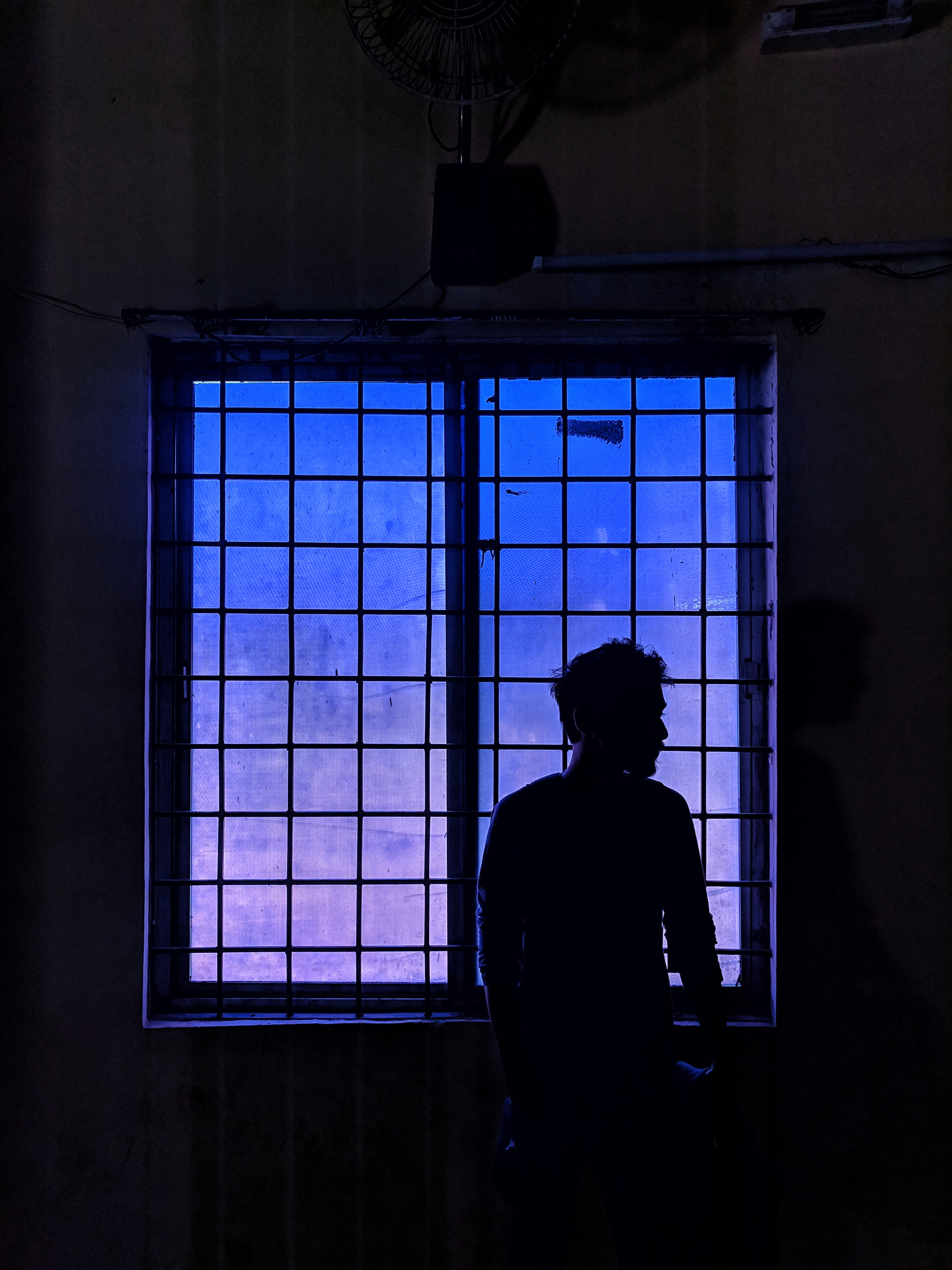 blue, brick, architecture, wall, building, lifestyles, nightlife, one person, 4K, sunlight, flare, indoors, leisure activity, art, person, stained glass, Phone HD Wallpaper