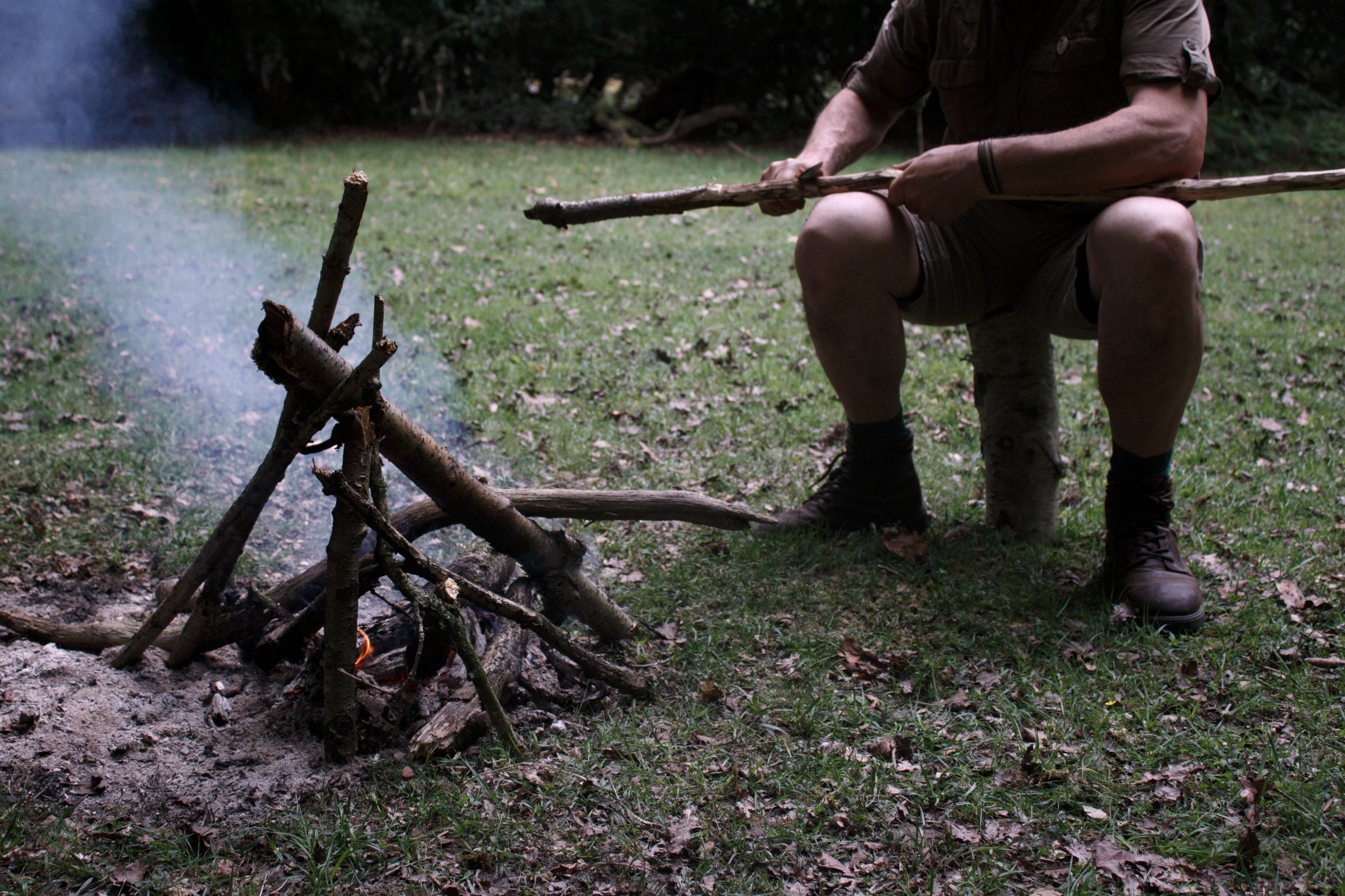 knife, holding, campfire, daytime, making, one man only, men, man, people, real people, adult, log, leisure activity, sadness, adults only, stick, full length, HD Wallpaper