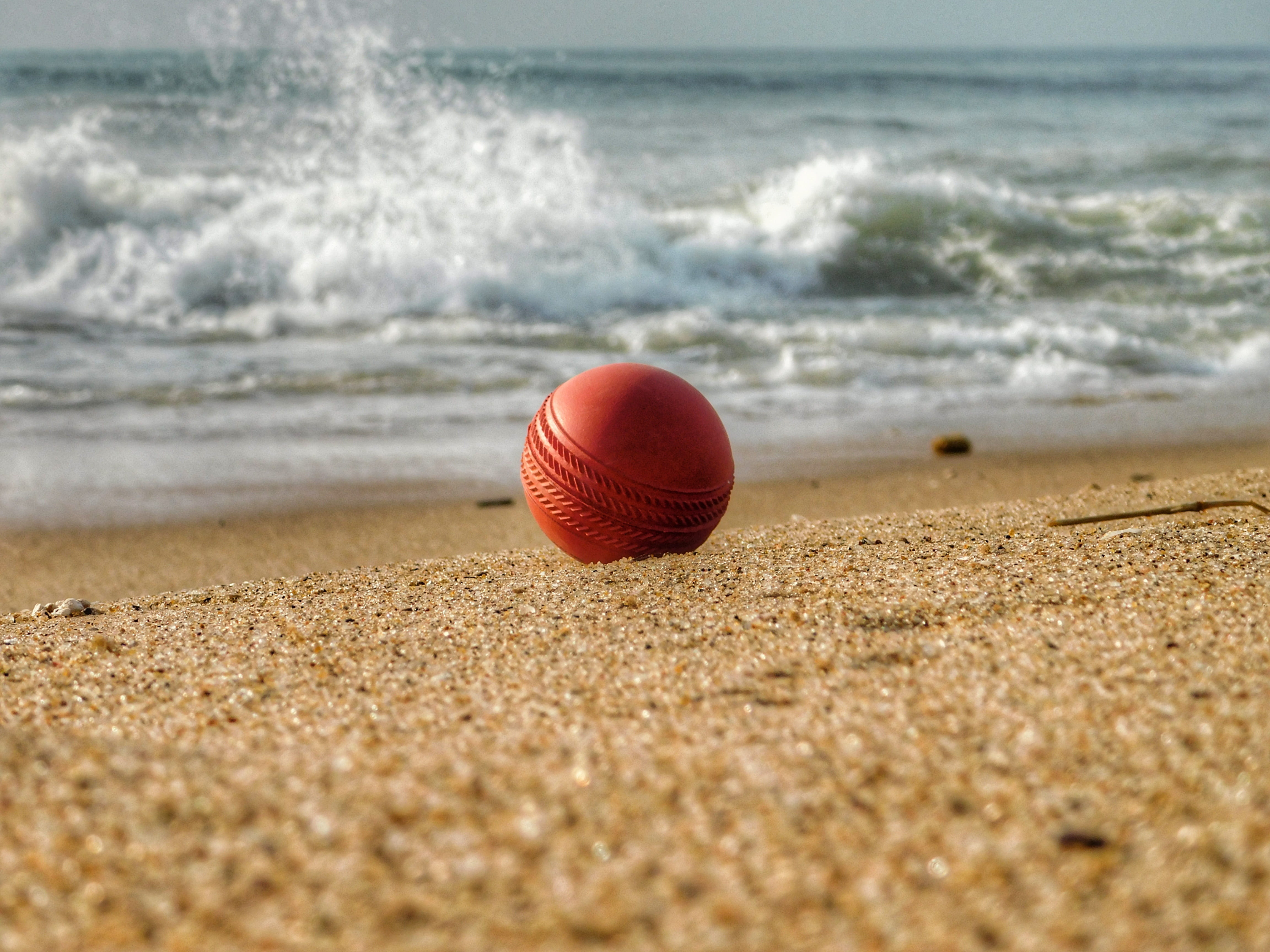 sand, wave, horizon, beauty in nature, outdoors, red, land, sea, ball, sport, nature, selective focus, water, tranquility, no people, 4K, motion, cricket, HD Wallpaper