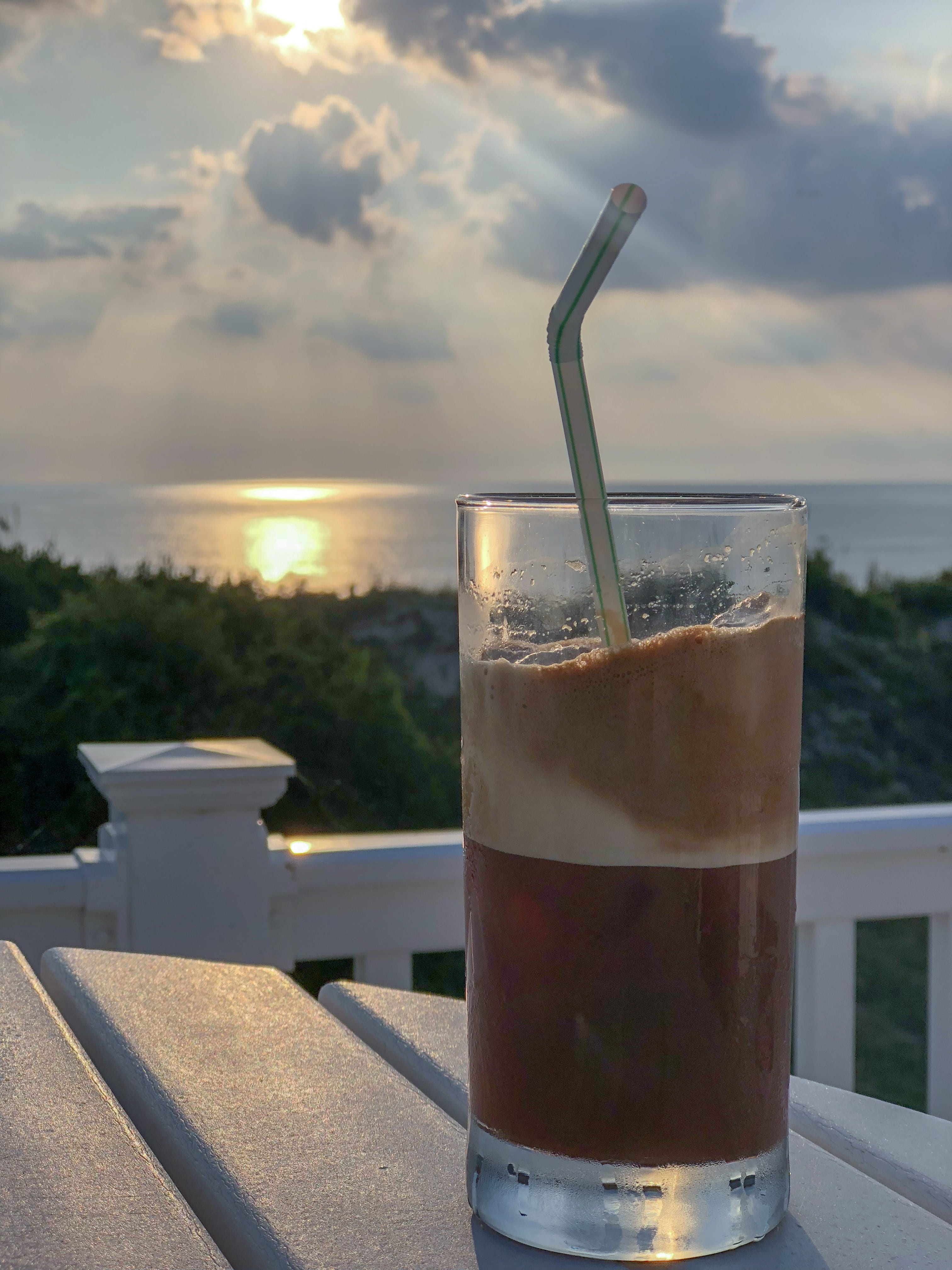 sunset, table, focus on foreground, sea, coffee, cloud - sky, food and drink, drinking glass, ice coffee, day, household equipment, freshness, refreshment, Phone HD Wallpaper