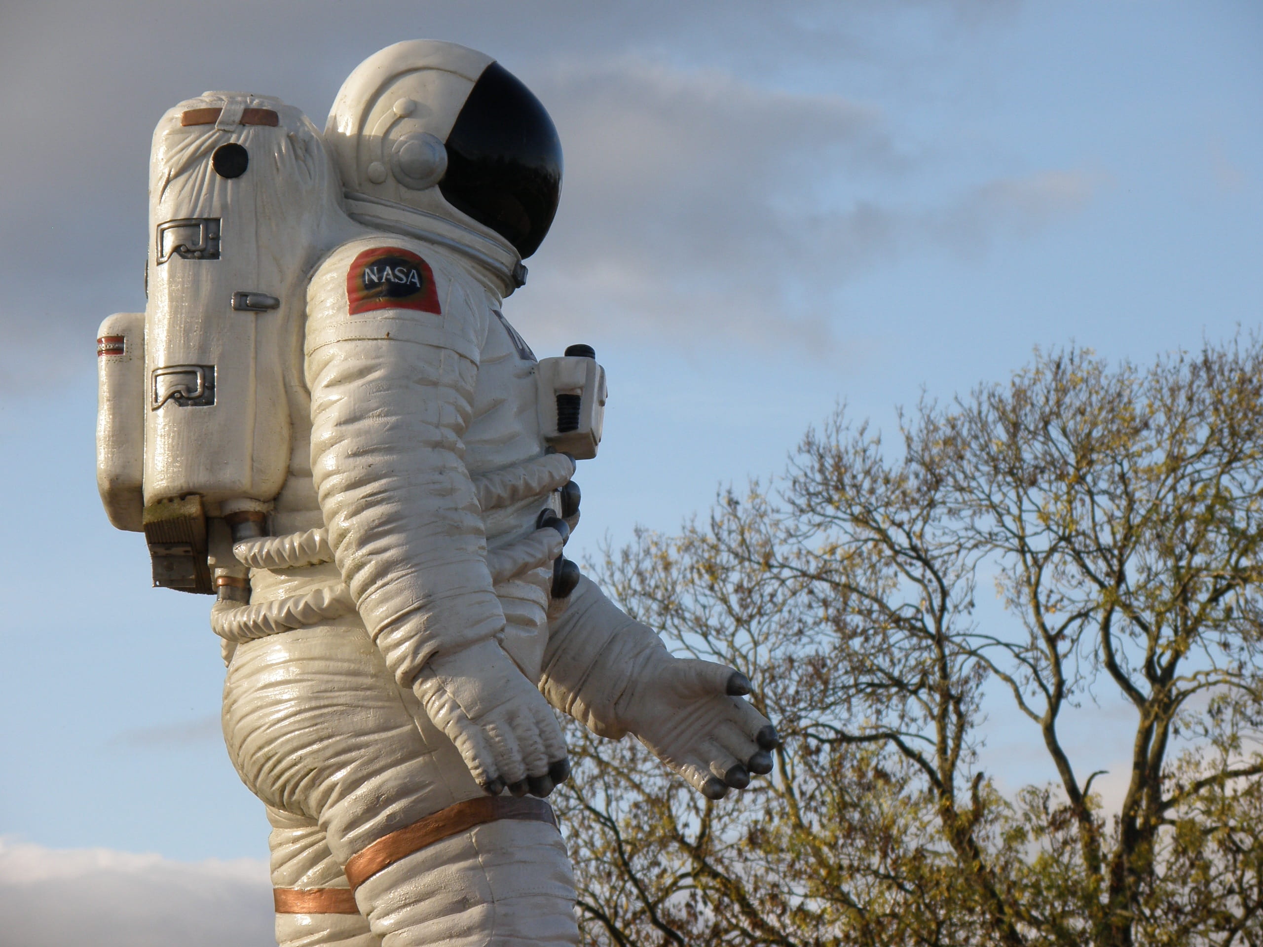 futuristic, Astronaut, rear view, plant, cloud - sky, one person, outdoors, sky, robot, sunlight, nature, Statue, human representation, day, creativity, HD Wallpaper