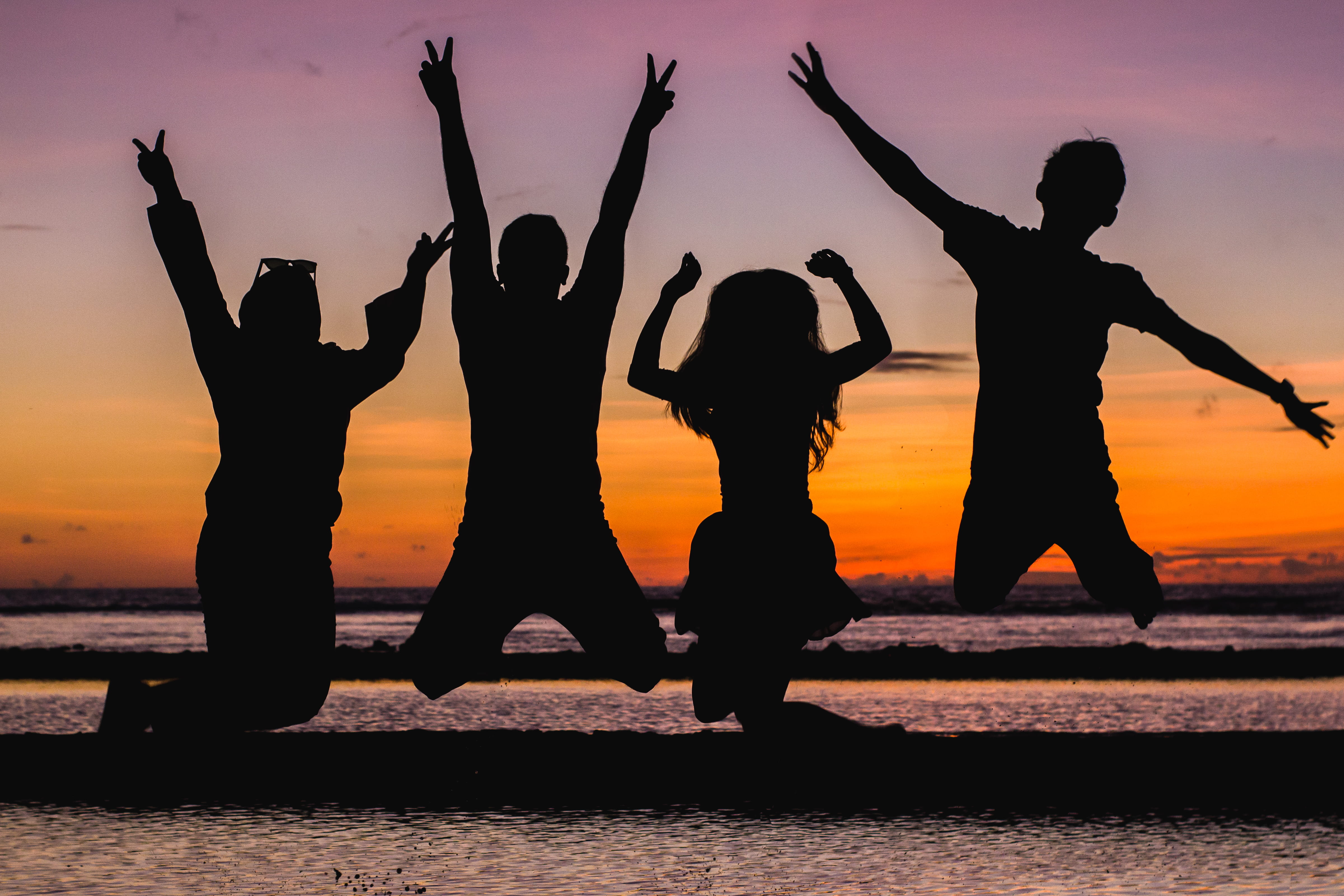 people, sand, friends, silhouette, bonding, togetherness, women, outdoorchallenge, leisure activity, friendship, sunset, sea, arms raised, beach, limb, HD Wallpaper