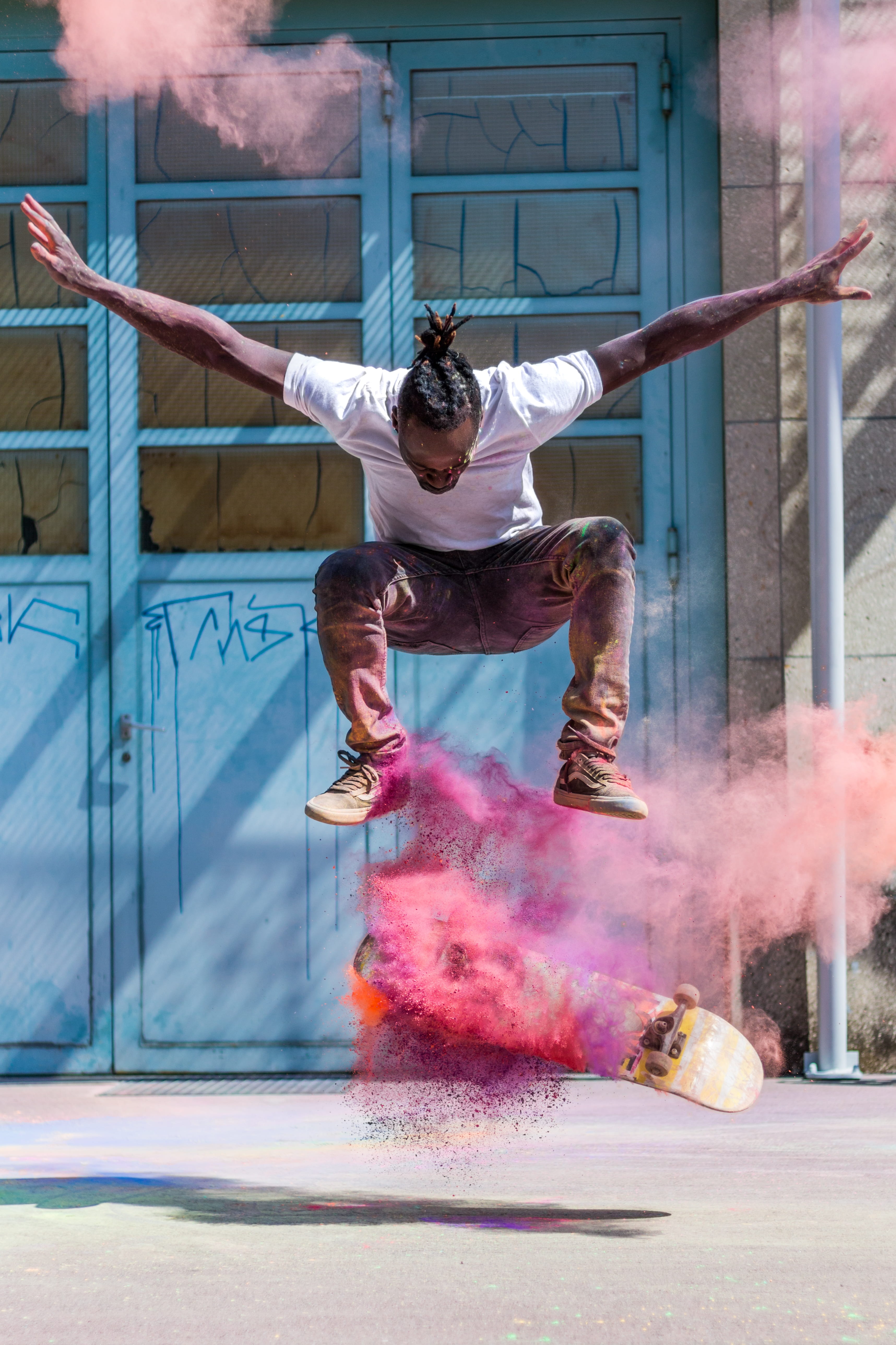 real people, vitality, man, holi powder, young men, hobby, built structure, fun, action, day, portrait, full length, human, colorful, men, lifestyle, one person, Phone HD Wallpaper