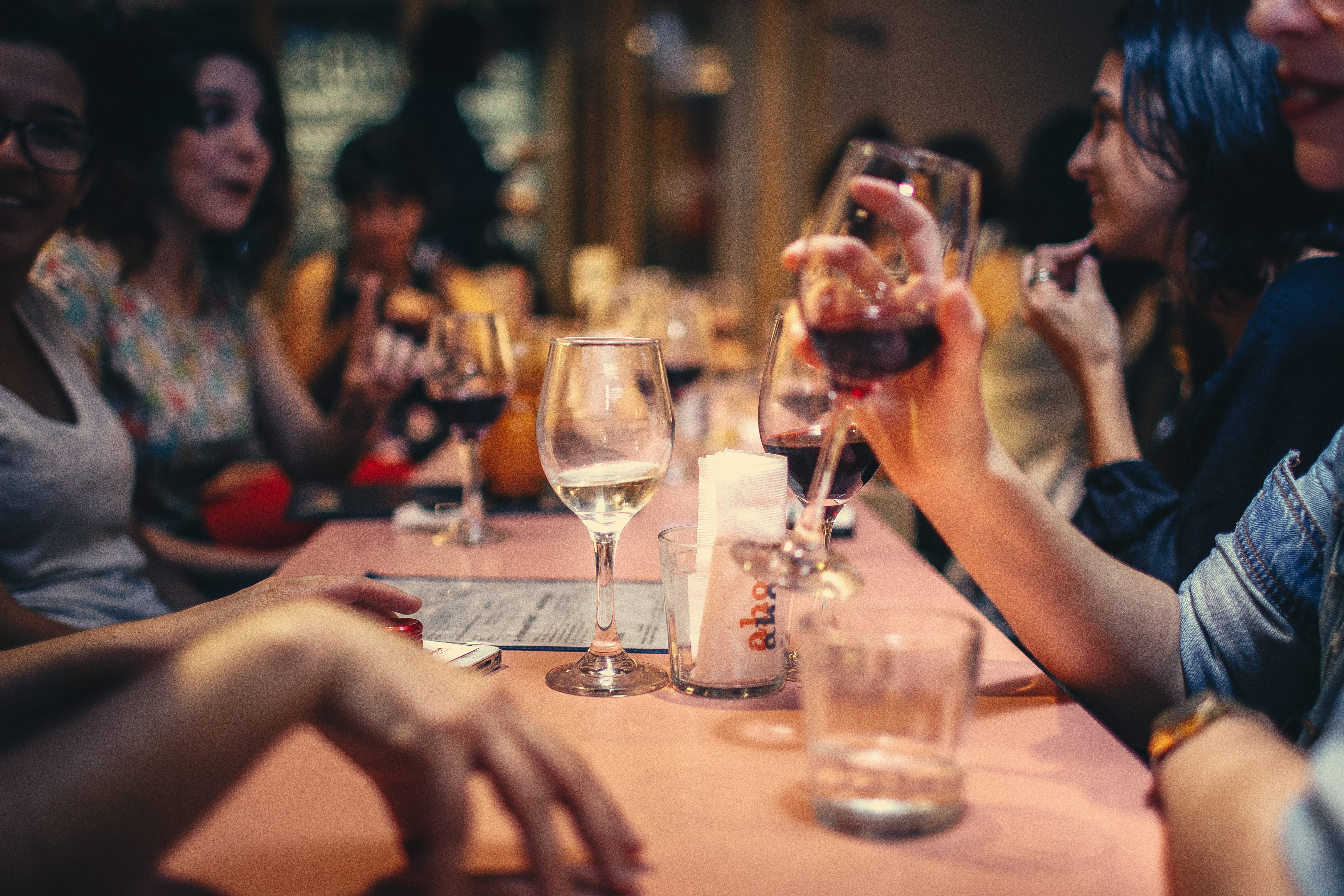 blurred background, table, table setting, women, drinking, restaurant, drink, young adult, social gathering, 4K, group, horizontal, facial expression, HD Wallpaper