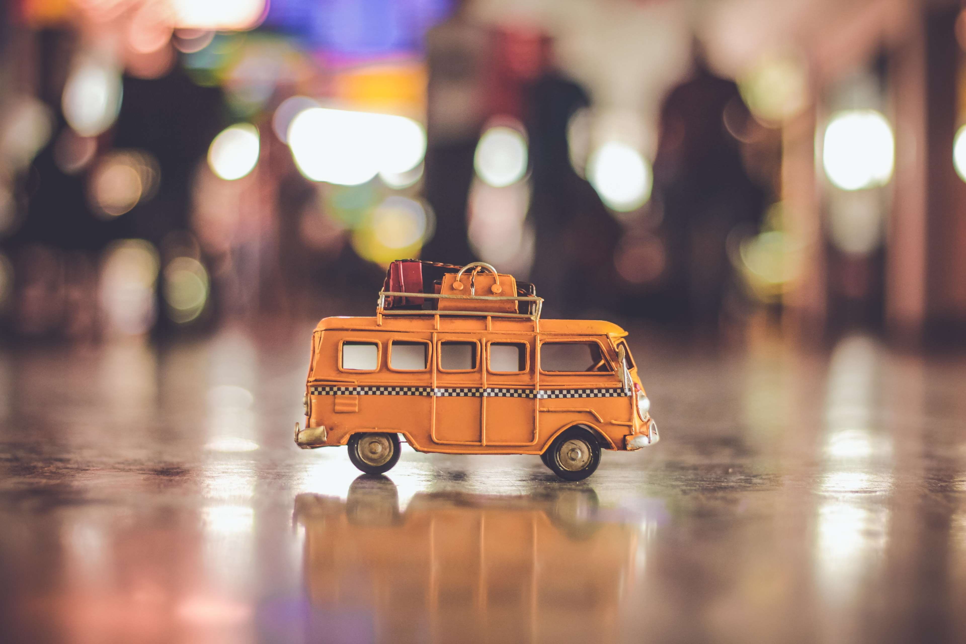 no people, motor vehicle, travel, city life, architecture, miniature, street, vehicle, city, night, yellow, suitcase, toy car, modern, illuminated, combi, HD Wallpaper