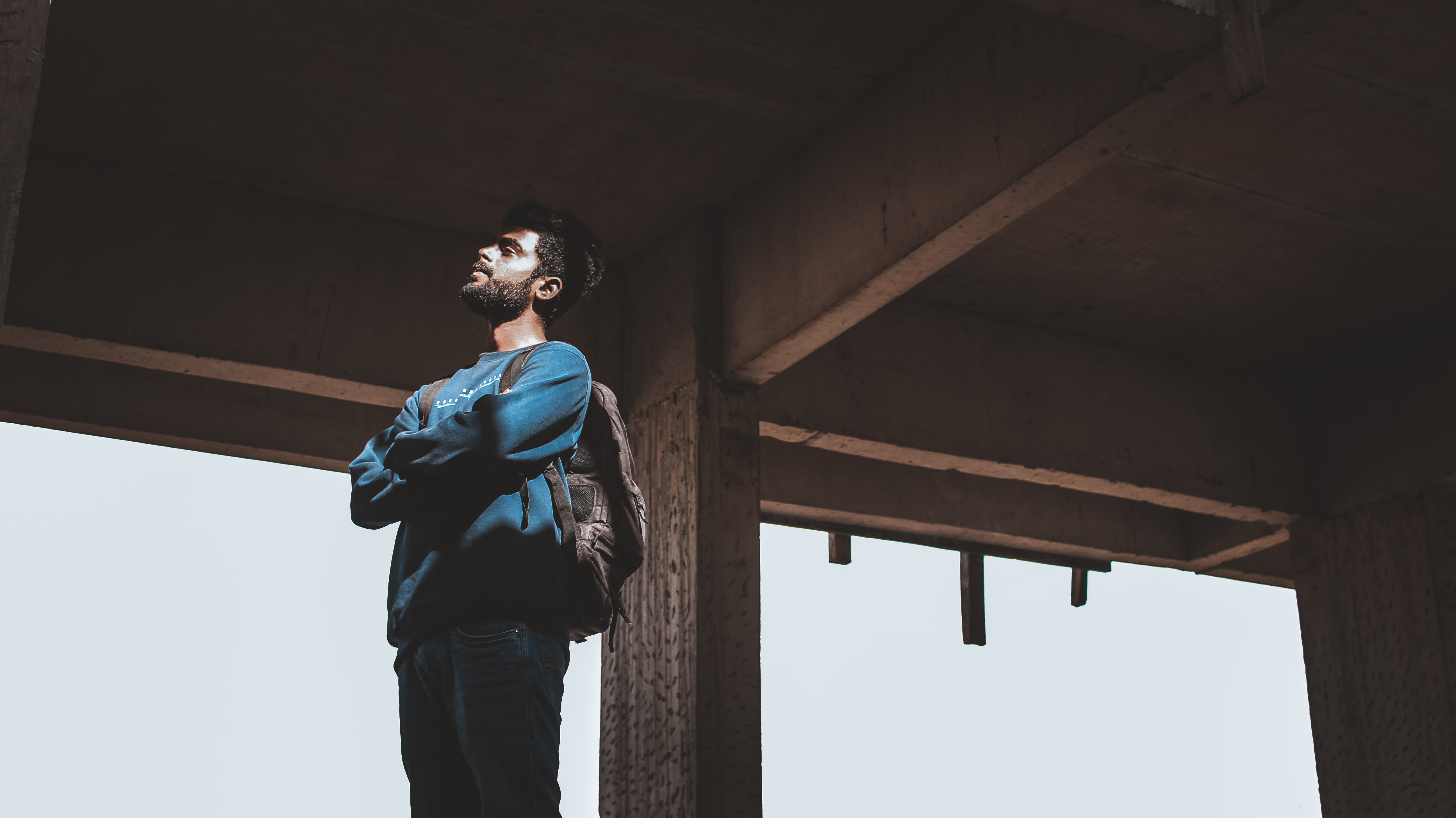 looking away, wood - material, brown, india, building, built structure, road, sleeve, real people, jacket, one person, architectural column, young adult, HD Wallpaper