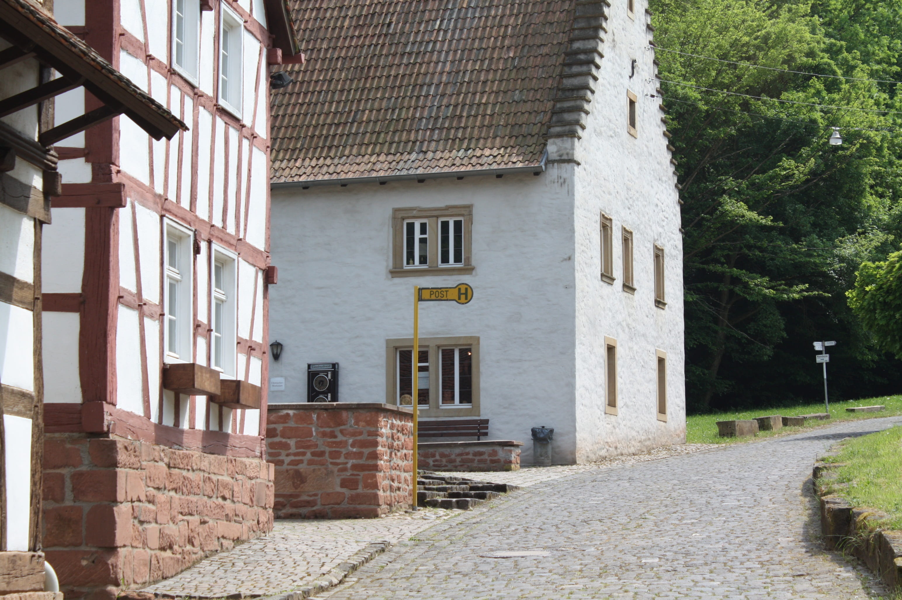 the way forward, footpath, bus stop, day, cobblestone, truss, no people, wall, nature, old town, direction, historically, street, house, building exterior, HD Wallpaper
