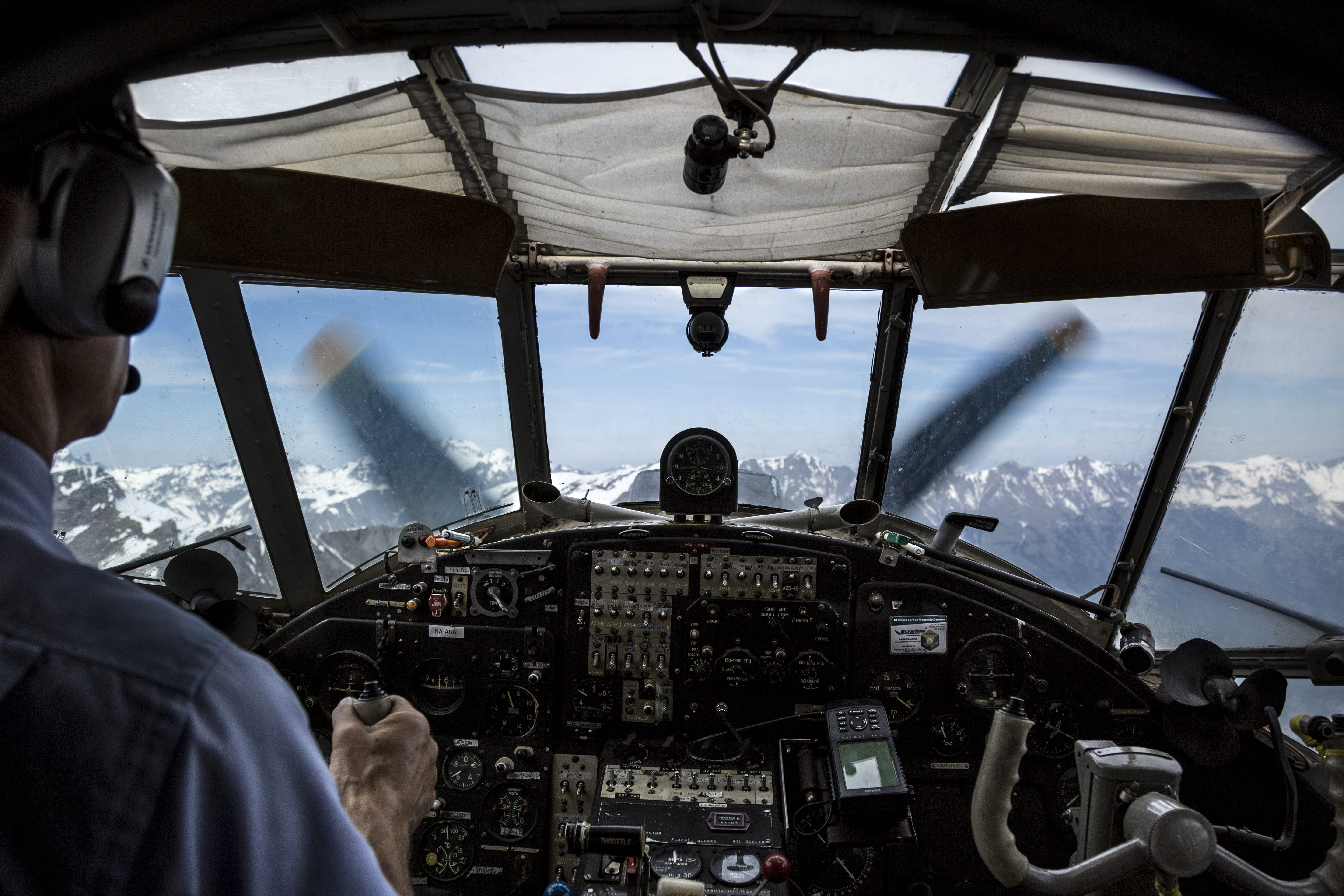 propella, windshield, transportation, alps, outdoors, back, mountain, piloting, human, uniform, nature, daytime, lever, person, glass - material, operating, HD Wallpaper
