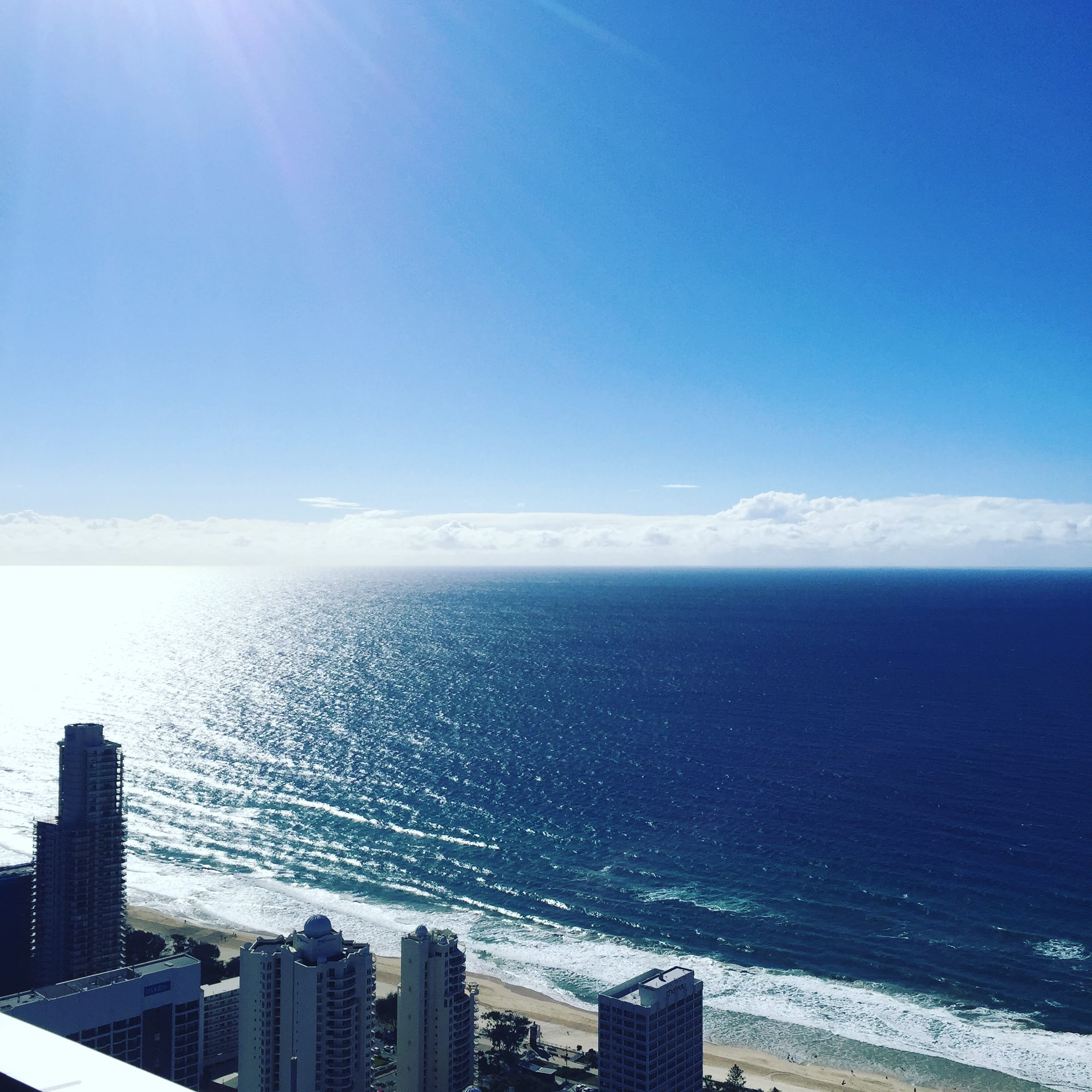 day, gold coast, 1080P, outdoors, horizon over water, district, paradise, name, nice, horizon, surfers, office building exterior, cityscape, skyscraper, Phone HD Wallpaper