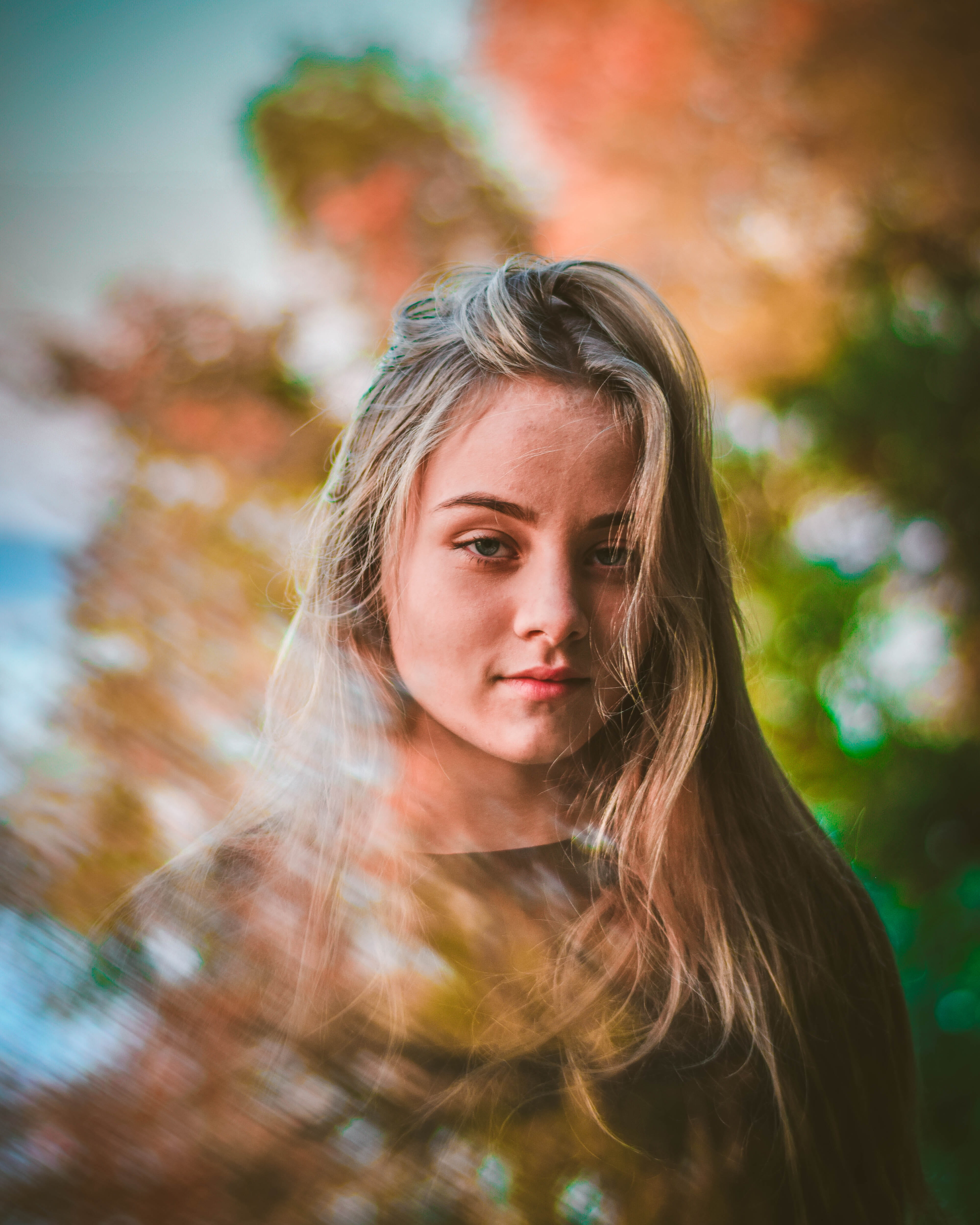 young adult, vegetation, real people, looking at camera, leaf, female, headshot, face, contemplation, girl, portrait, hair, one person, grass, hairstyle, Phone HD Wallpaper