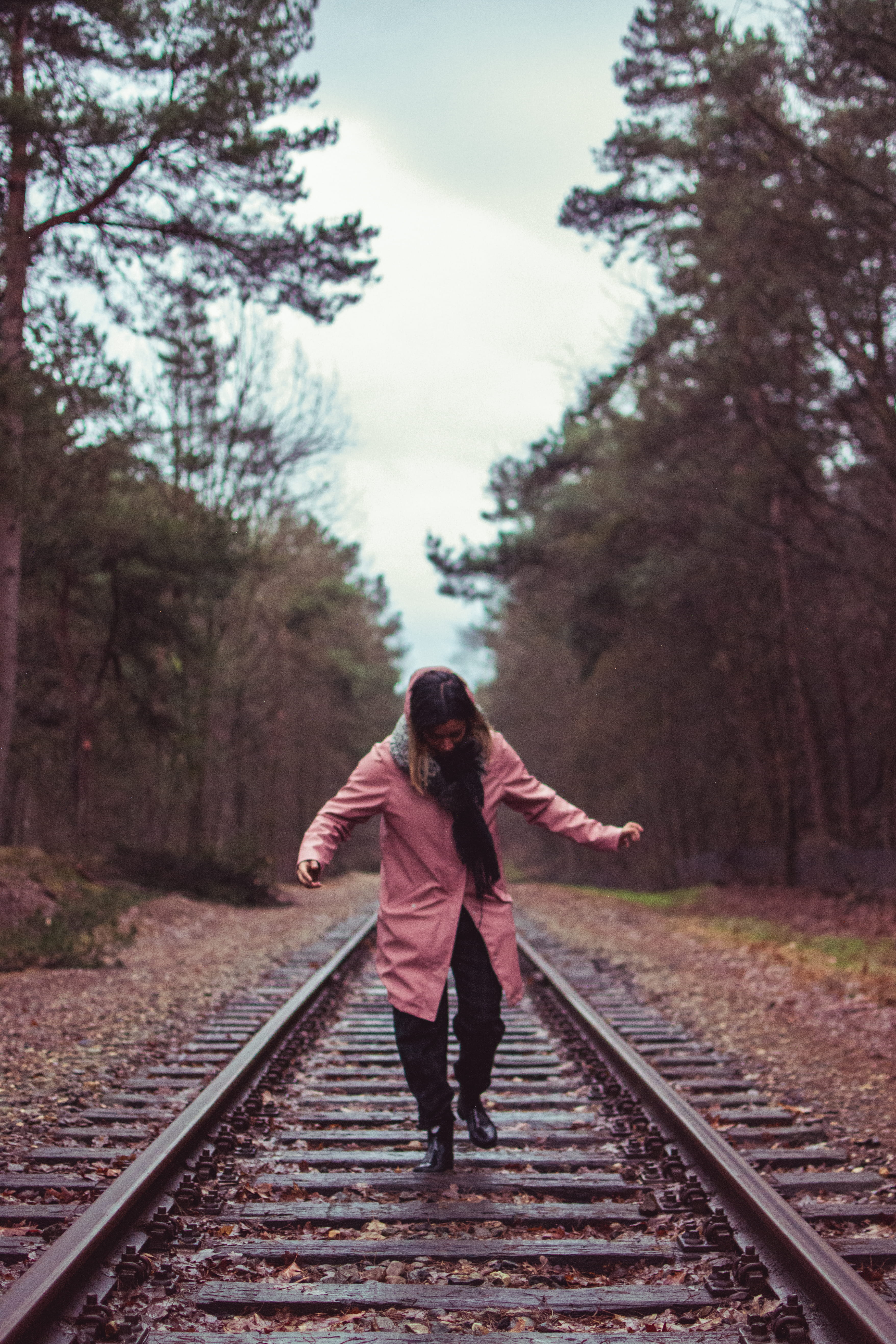 pink, 5K, outdoors, raincoat, one person, railway, standing, diminishing perspective, transportation, fall, railroad track, train, rail transportation, Phone HD Wallpaper