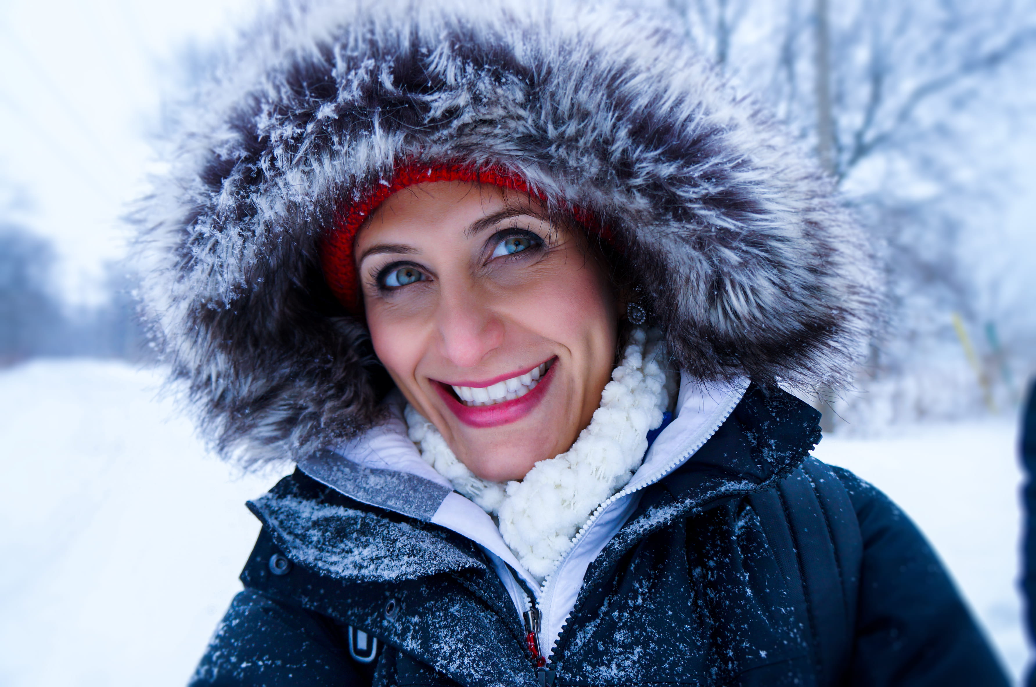 trees, one person, smiling, human, snowing, outerwear, weather, snow, ice, zip, cold temperature, wear, young adult, blurred background, women, snowfall, HD Wallpaper