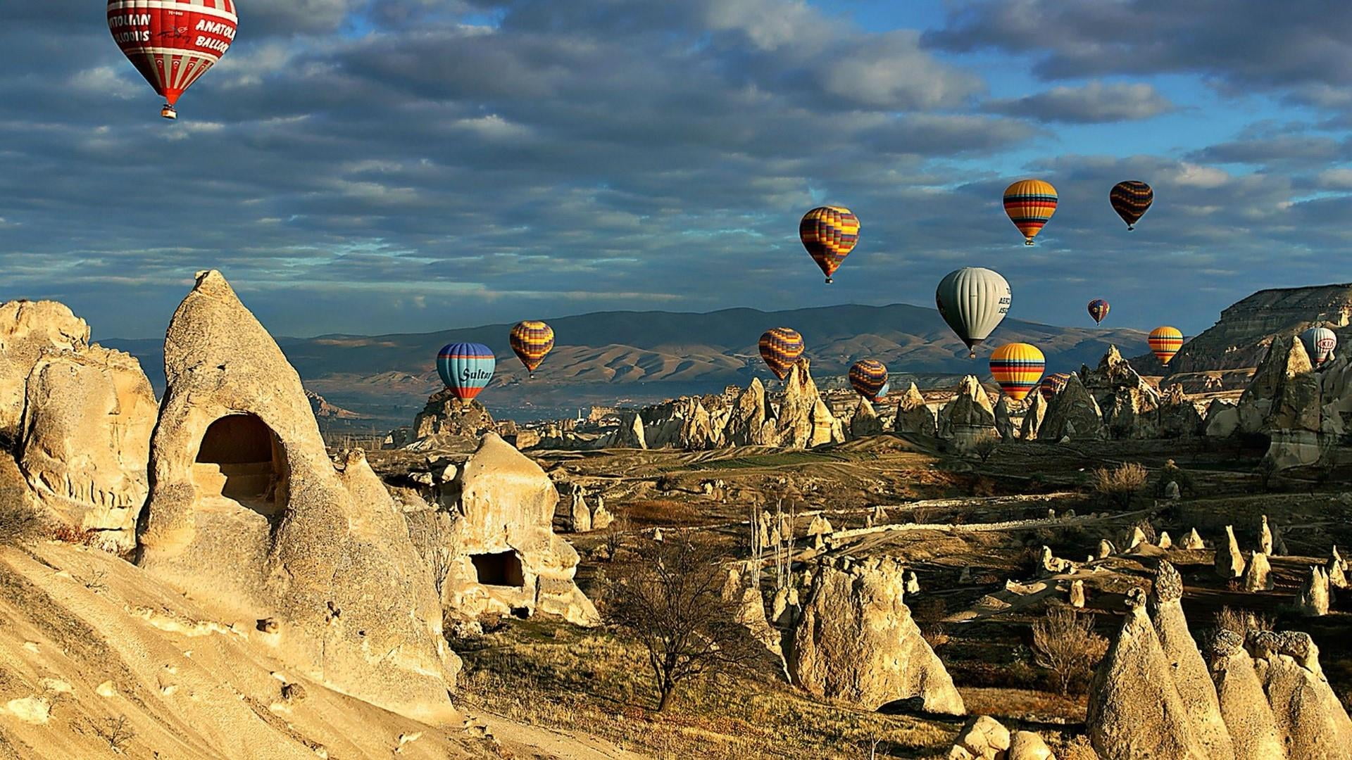 environment, 1080P, transportation, tourism, day, hot air balloon, flying, landscape, built structure, ancient, the past, nature, turkey, ancient civilization, HD Wallpaper