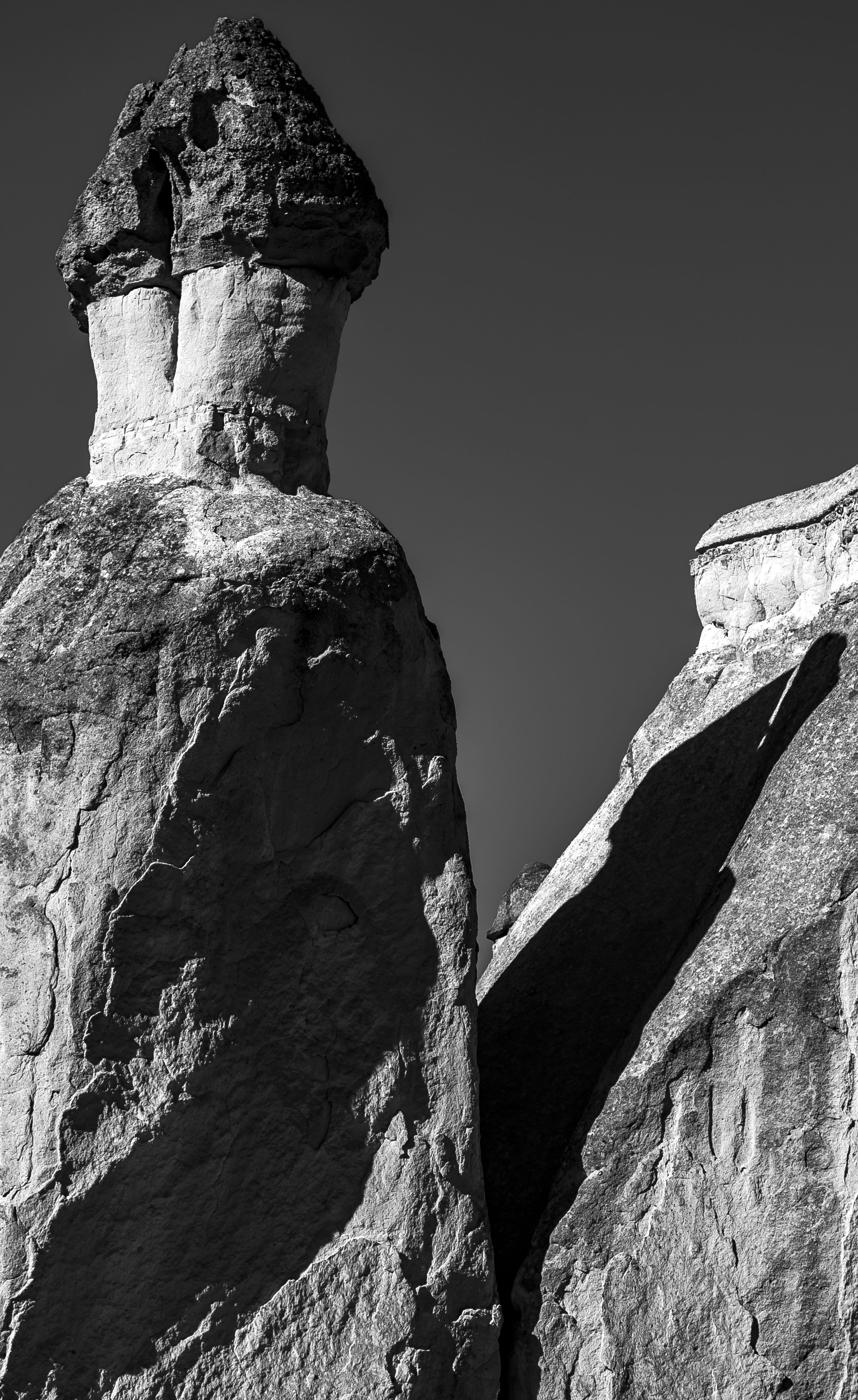 rock formation, eroded, Black and White, 2017, Chimney, 5K, sunlight, hulkiokantabak, scenics - nature, travel destinations, fairy chimney (peri bacasi) at cappadocia, Phone HD Wallpaper