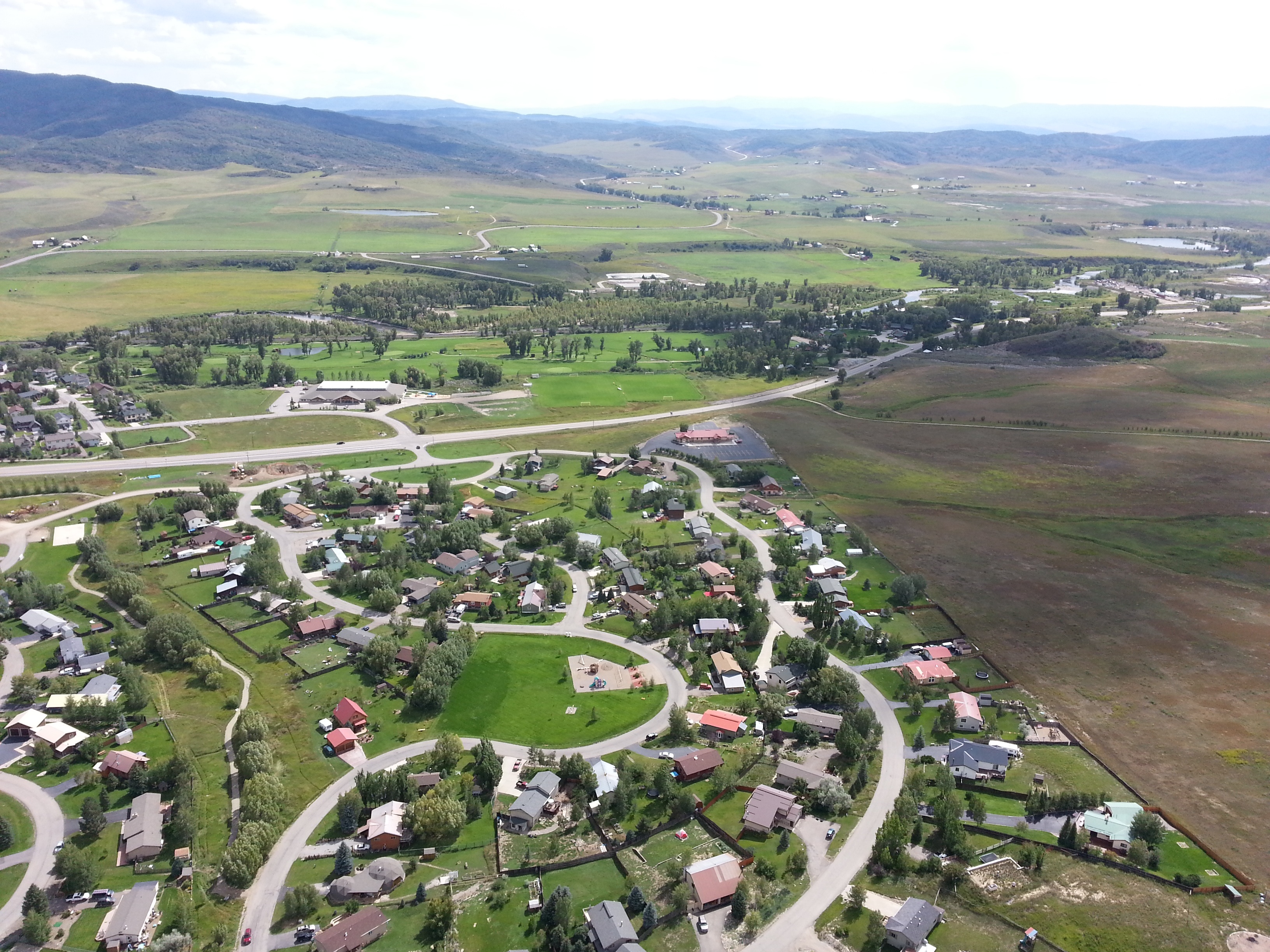 no people, landscape, tranquil scene, outdoors, road, steamboat springs, high angle view, beauty in nature, grass, green color, tree, day, aerial view, HD Wallpaper