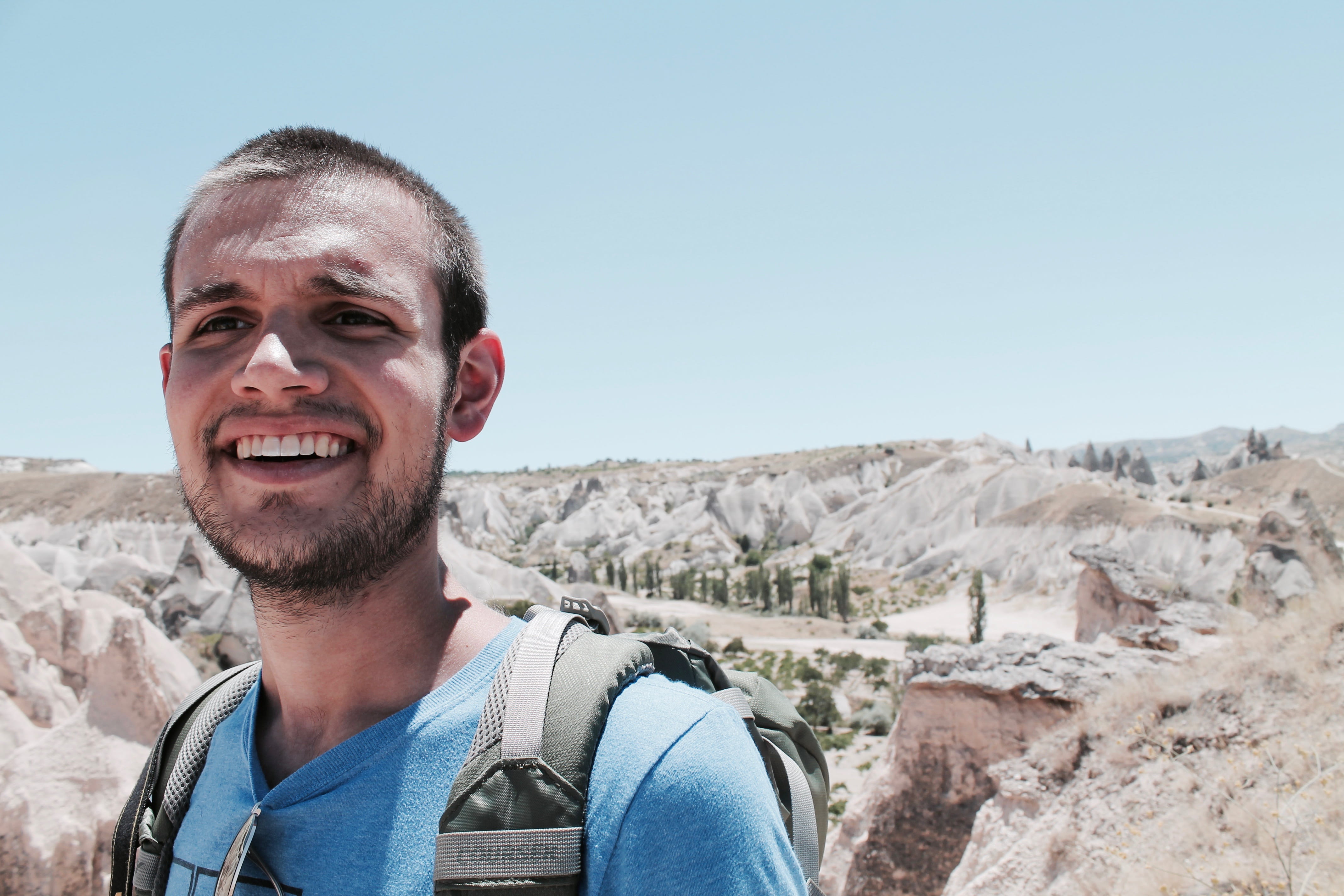 young men, day, front view, heat, hiking, headshot, beard, smiling, men, portrait, young adult, sky, standing, leisure activity, outdoors, cappadocia, nature, HD Wallpaper