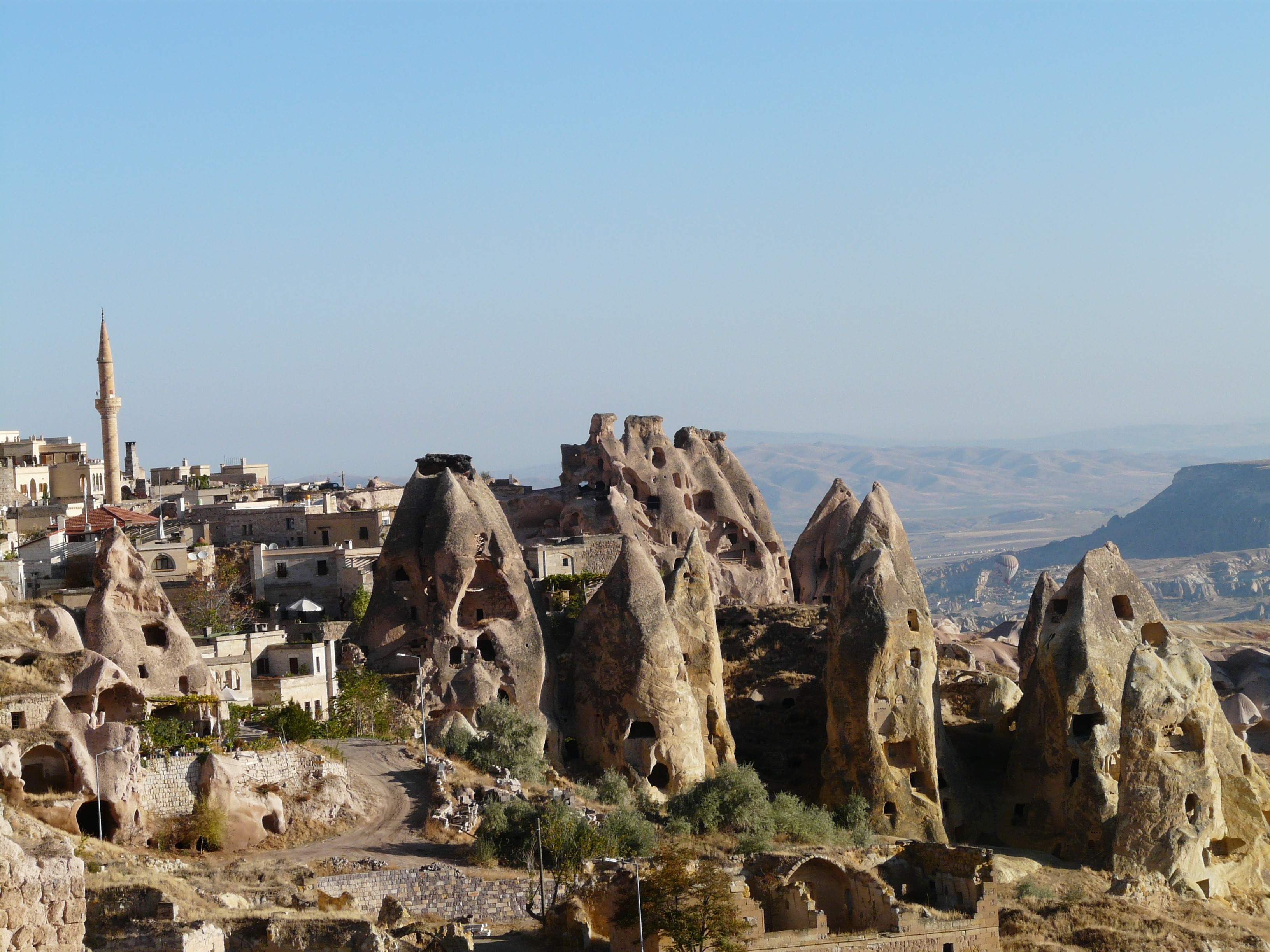 fairy towers, travel destinations, houses, no people, tuff stone dwellings, mountain, sky, rock, ancient civilization, fairy chimneys, outdoors, apartments, HD Wallpaper
