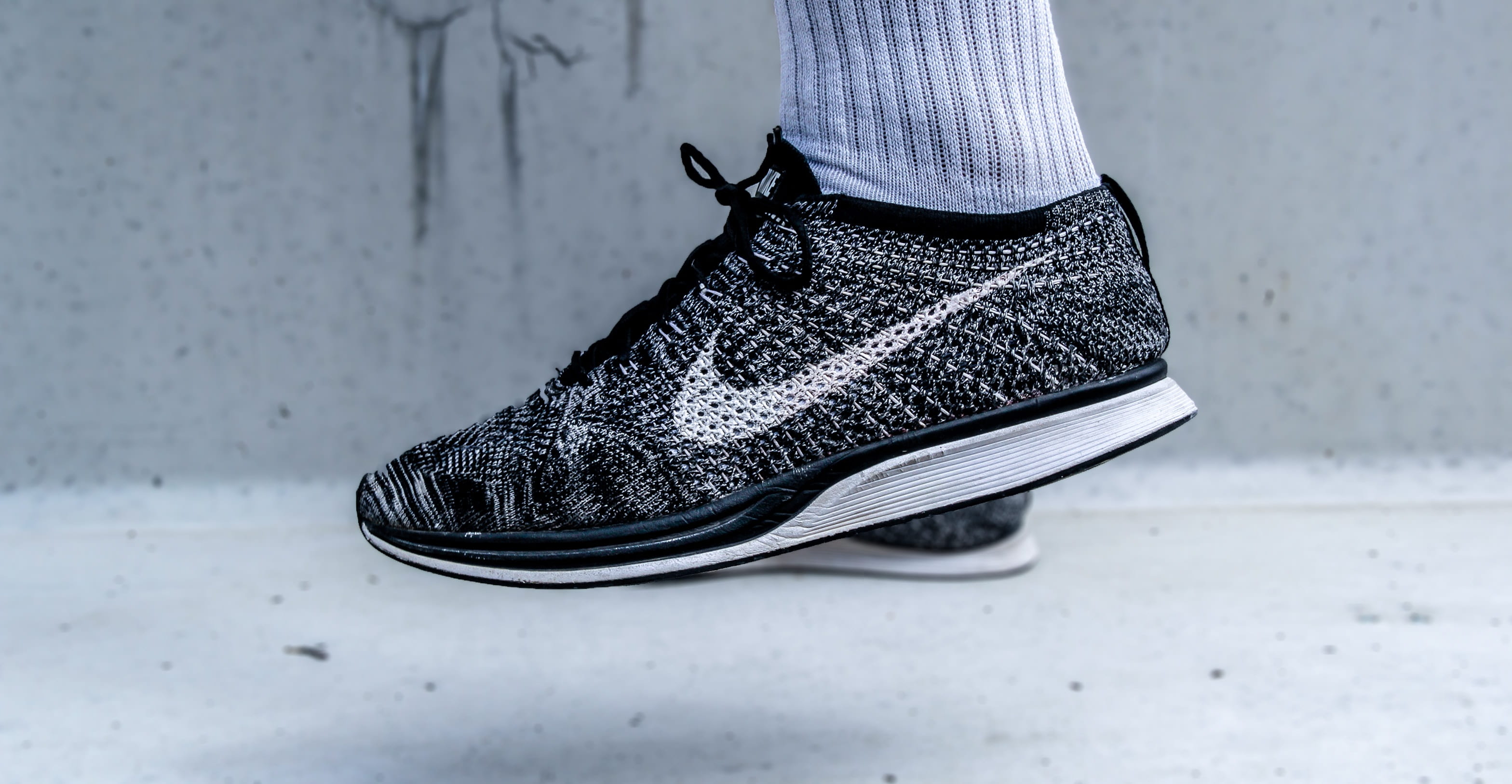 black, fashion, person, 2K, high heels, footwear, flyknit racer, womenswear, clothing, nike, shoe, top, human body part, one person, casual clothing, wearing, HD Wallpaper